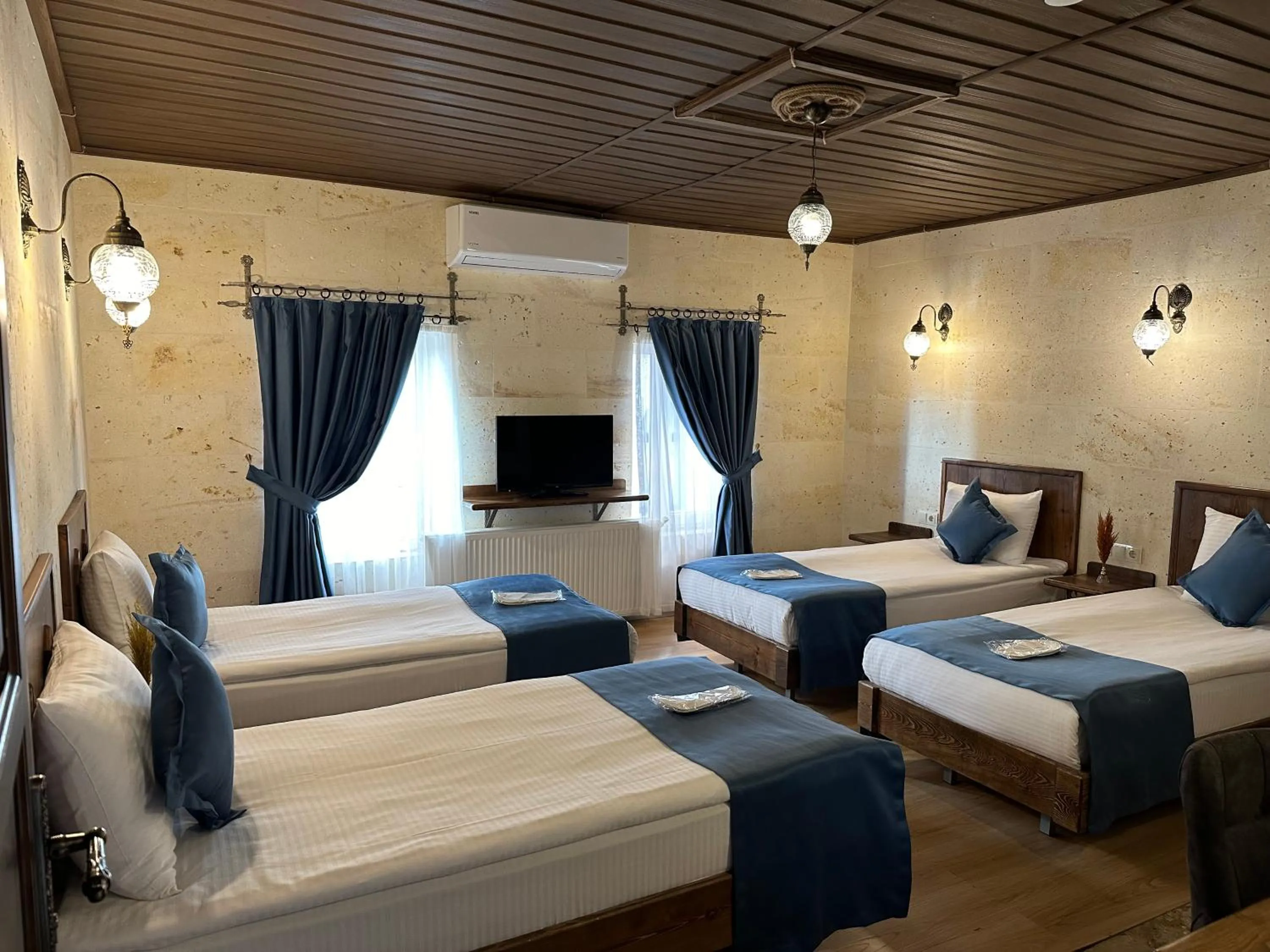 Bed in Virtus Cappadocia Hotel Göreme