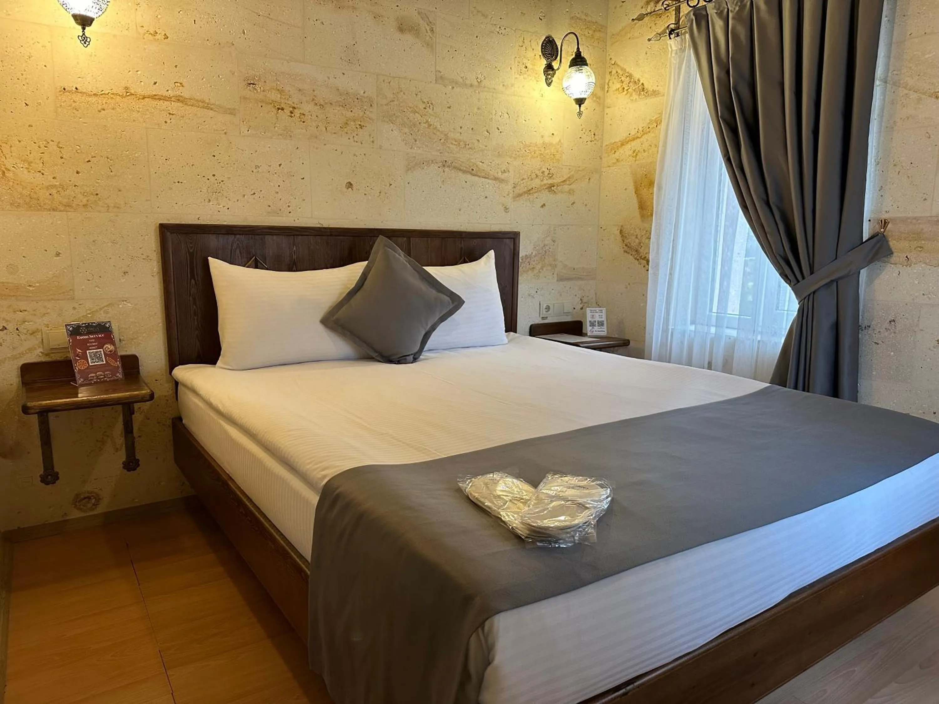 Bed in Virtus Cappadocia Hotel Göreme