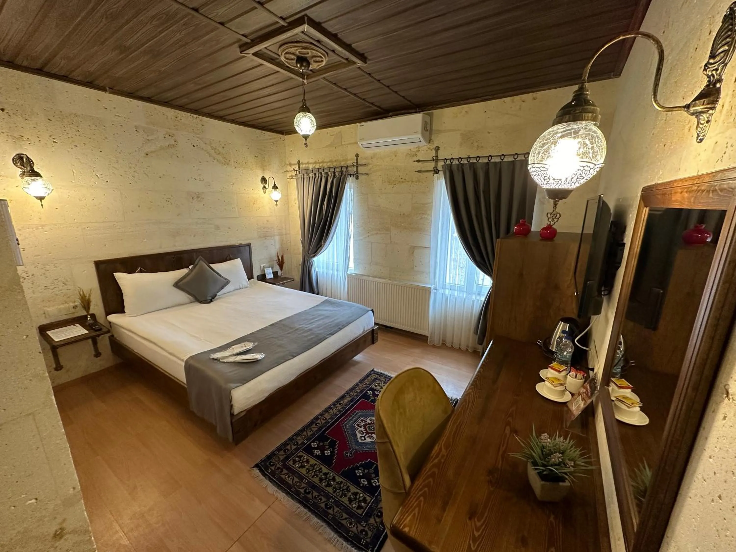 Bed in Virtus Cappadocia Hotel Göreme