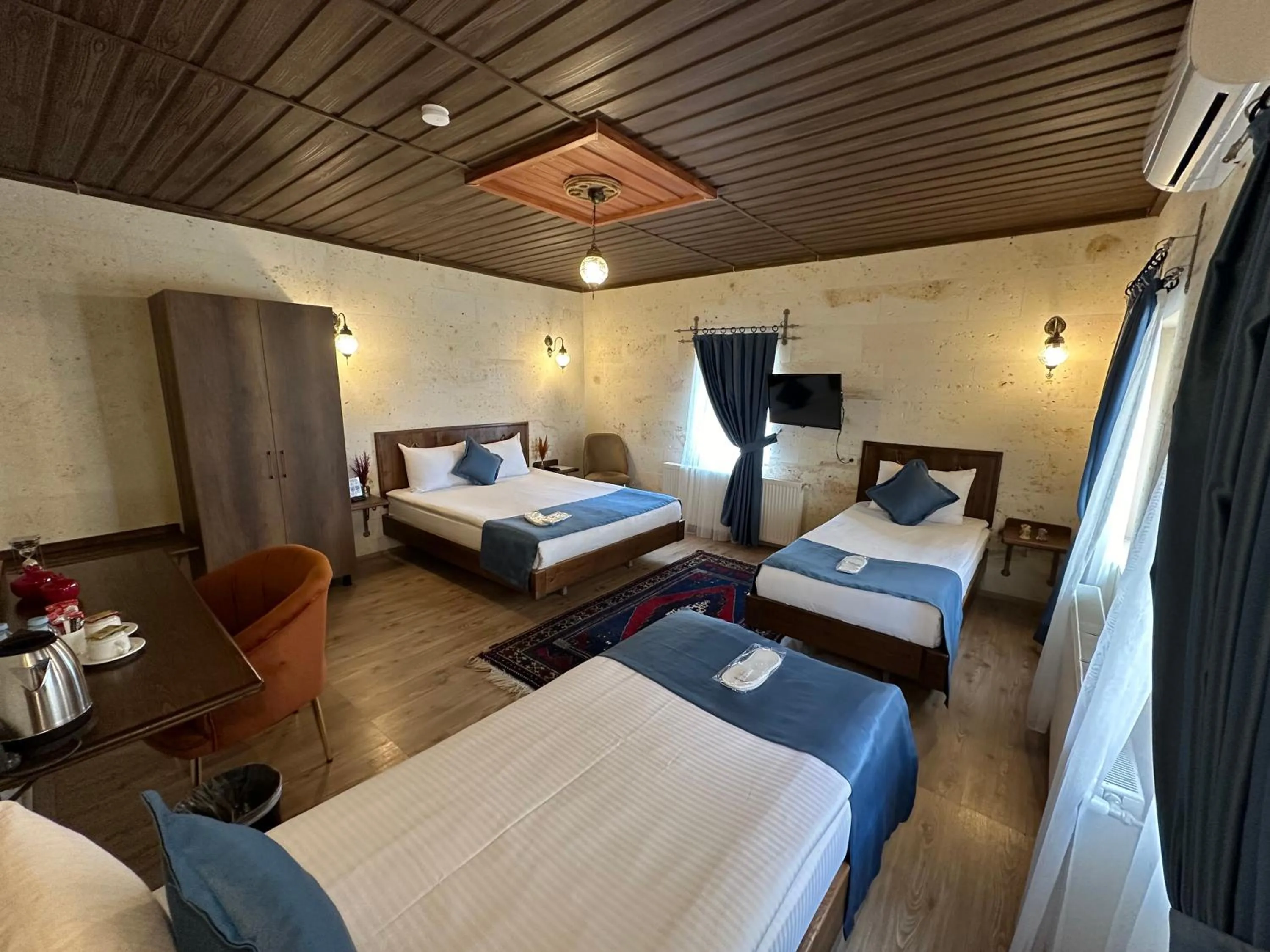 Bed in Virtus Cappadocia Hotel Göreme