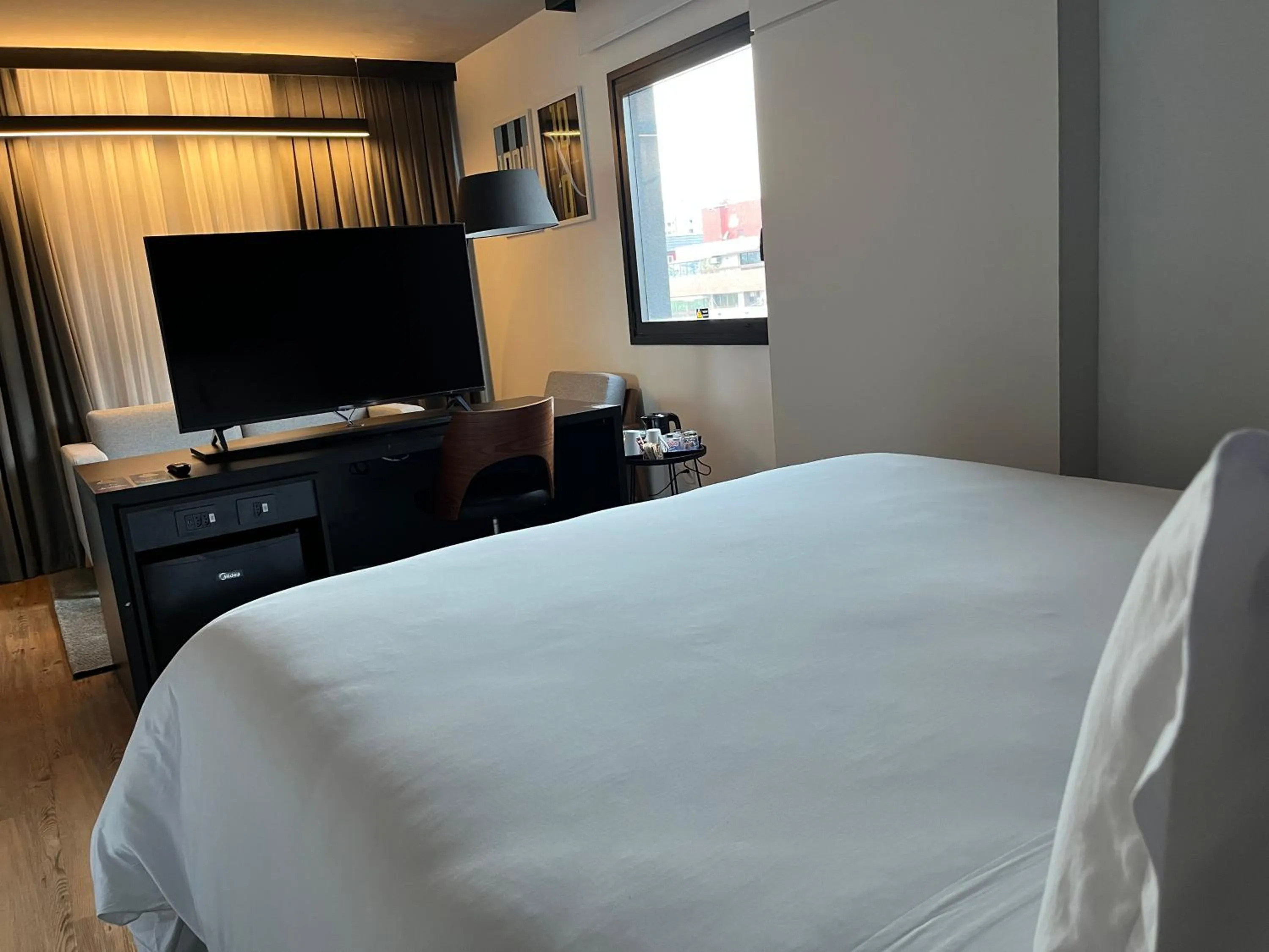 Photo of the whole room, Bed in Park Plaza Moinhos Porto Alegre