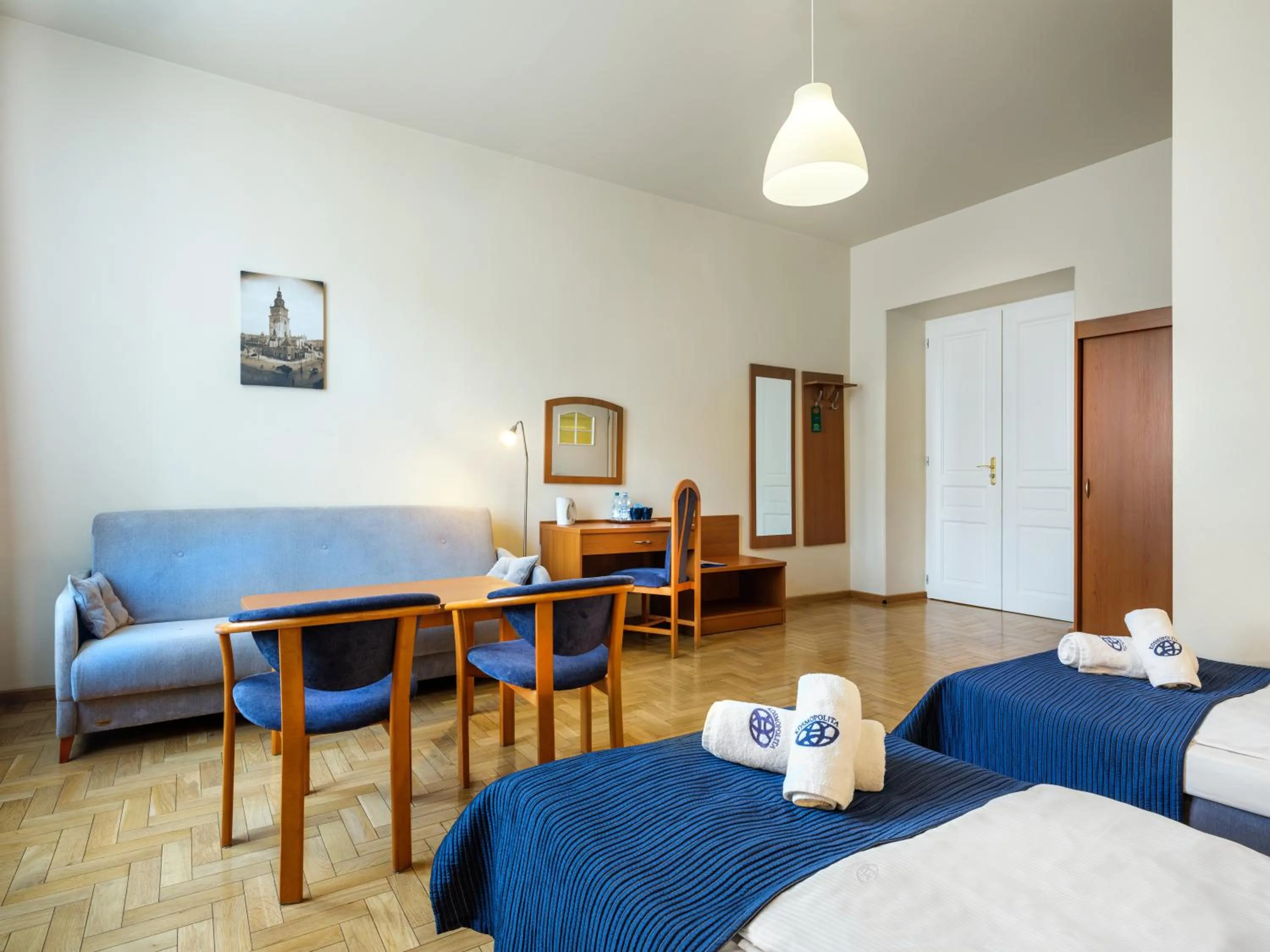 Bed in Kosmopolita Rooms