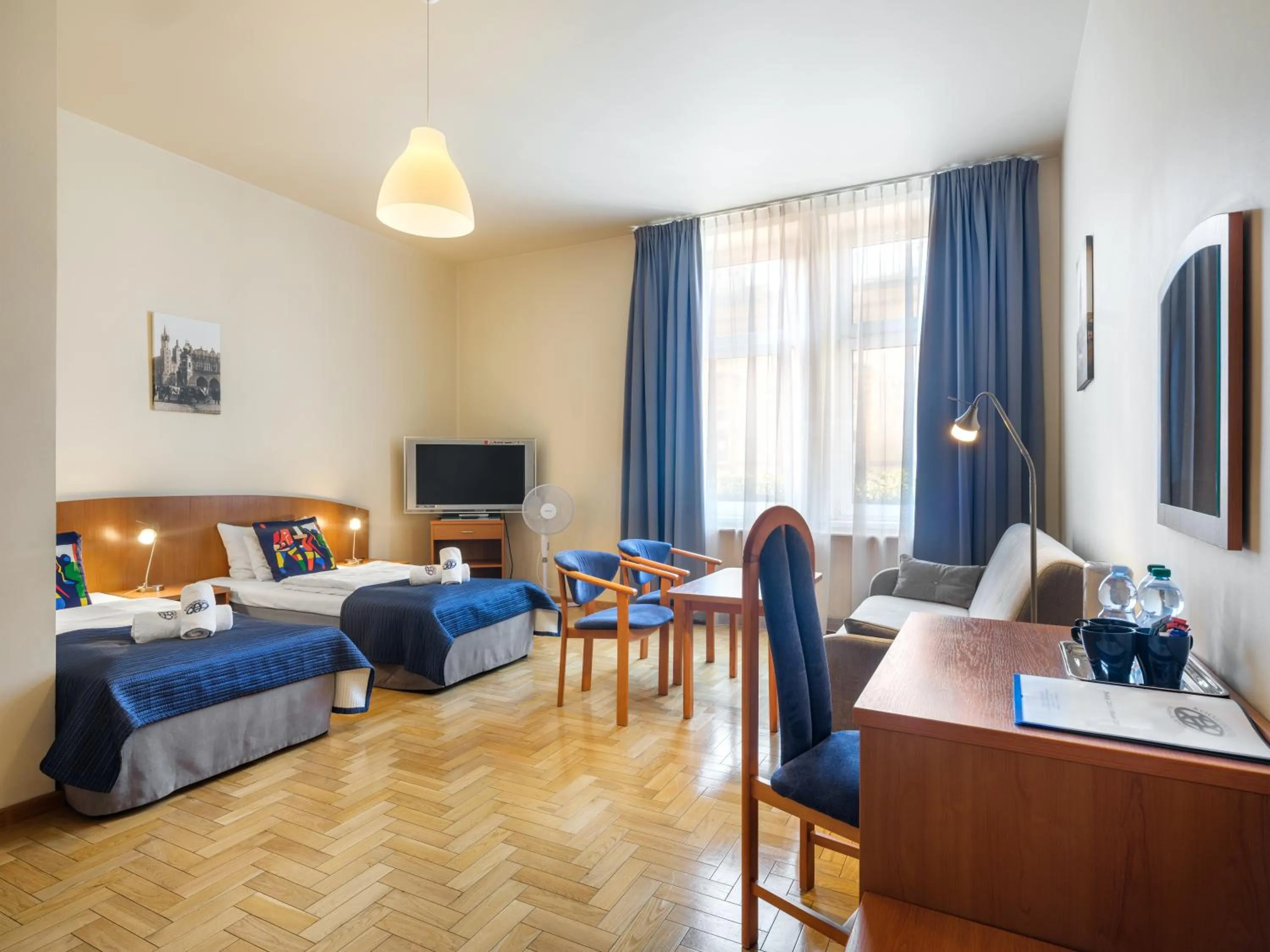 Bed in Kosmopolita Rooms