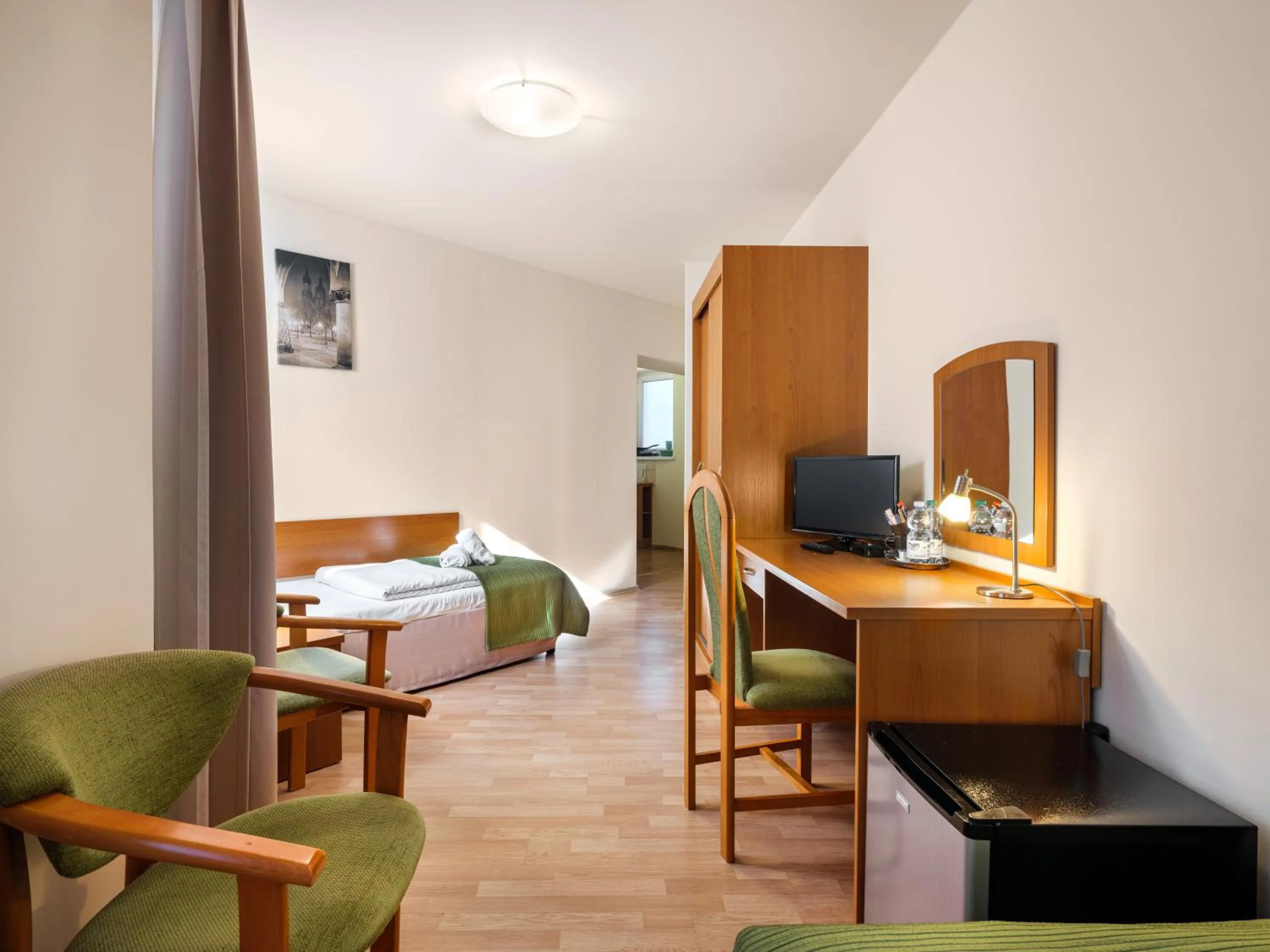 Bed in Kosmopolita Rooms