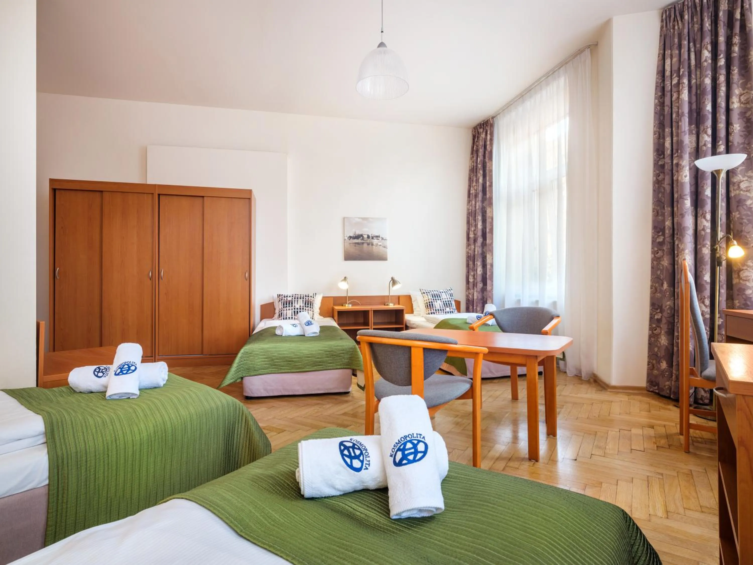 Bed in Kosmopolita Rooms