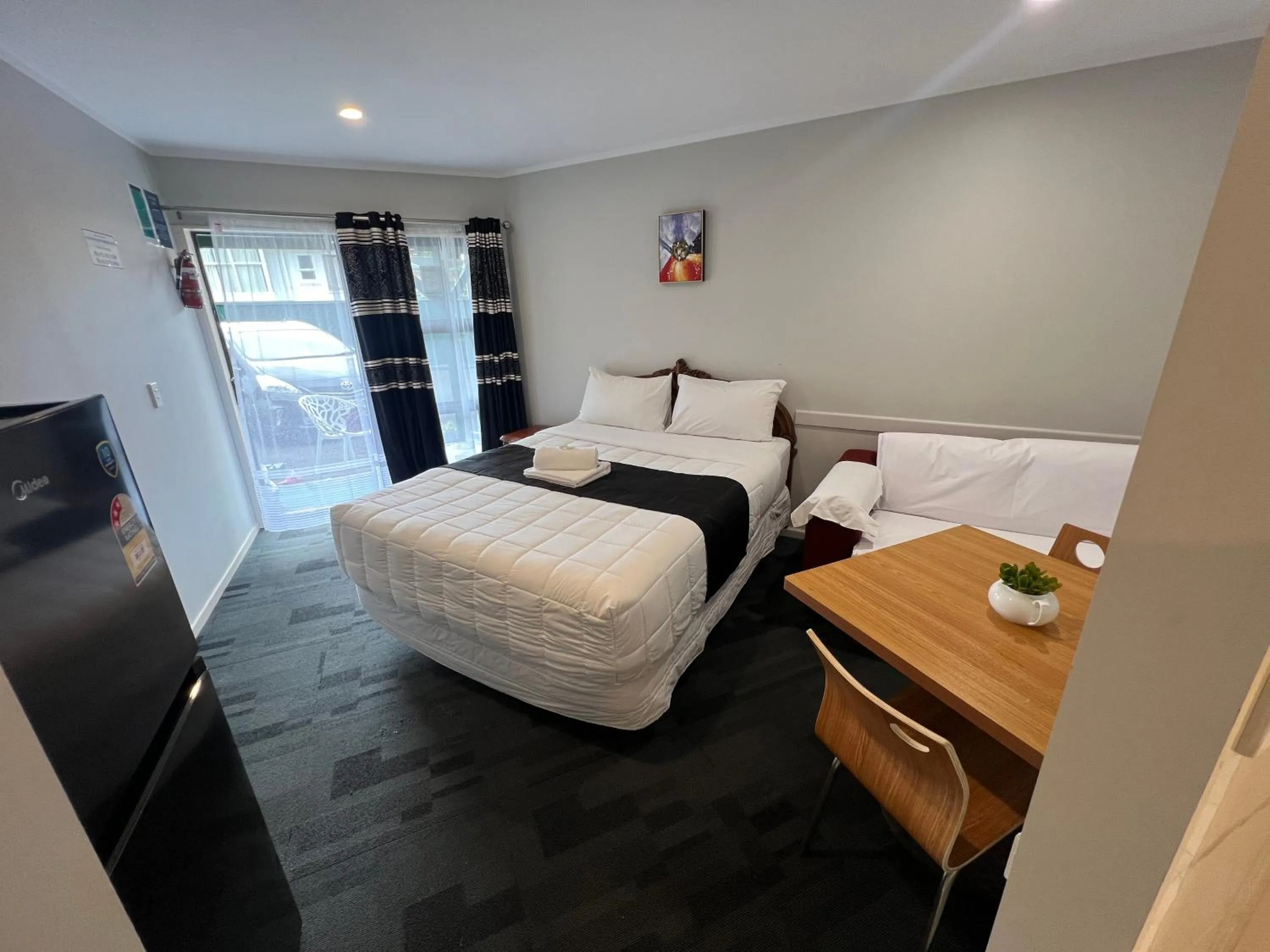 Bed in Monument Motor Lodge Papakura