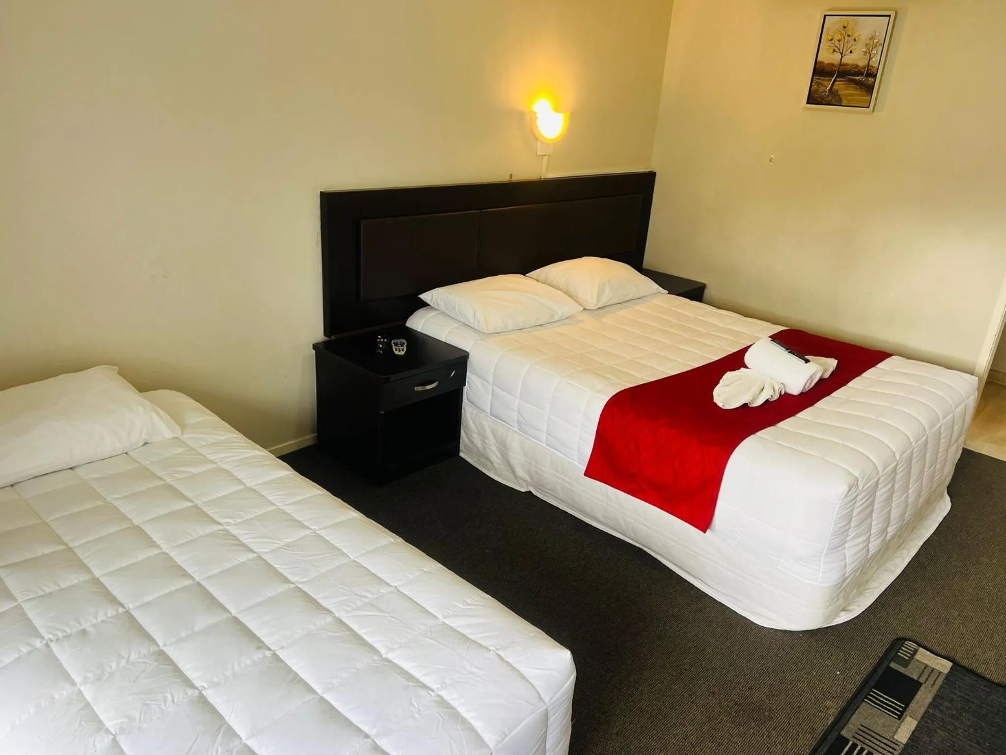 Bed in Monument Motor Lodge Papakura