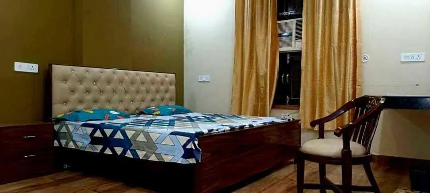 Bedroom in Hotel O Sky Hills Near Chaudhary Charan Singh International Airport