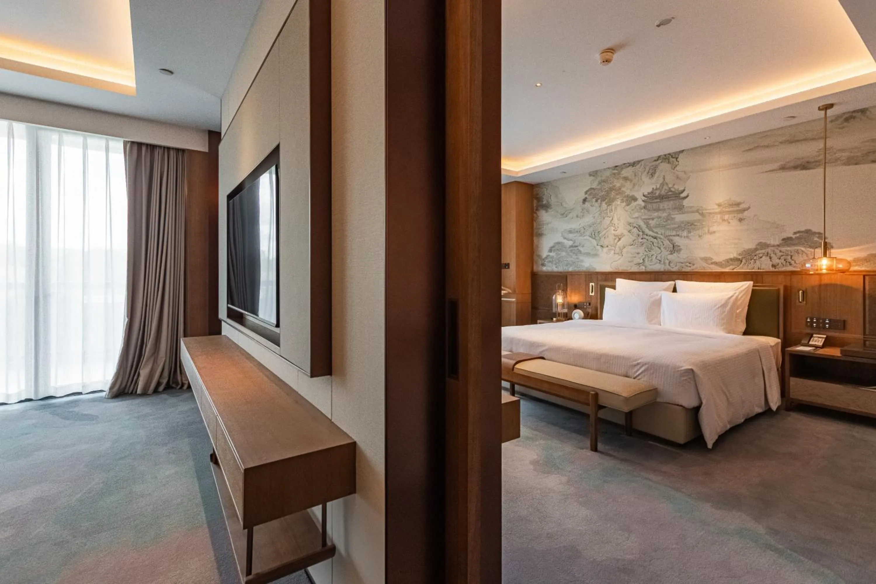 Communal lounge/ TV room, Bed in Pullman Yuxi