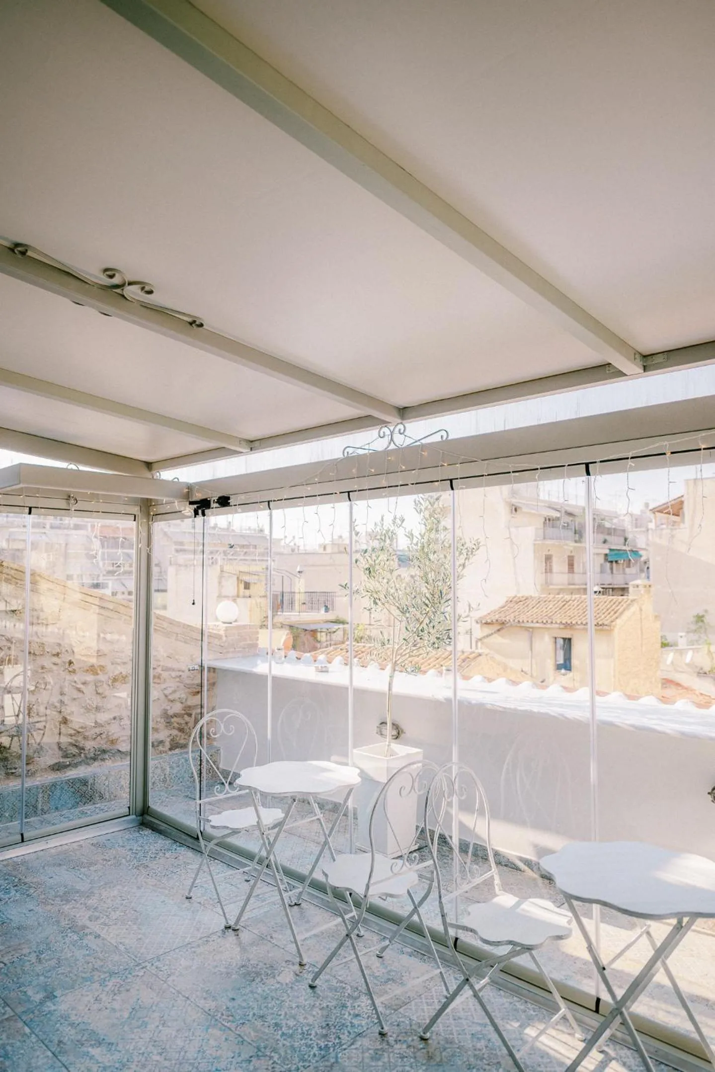 Patio in Neapolis 1897 Boutique Luxury Rooms