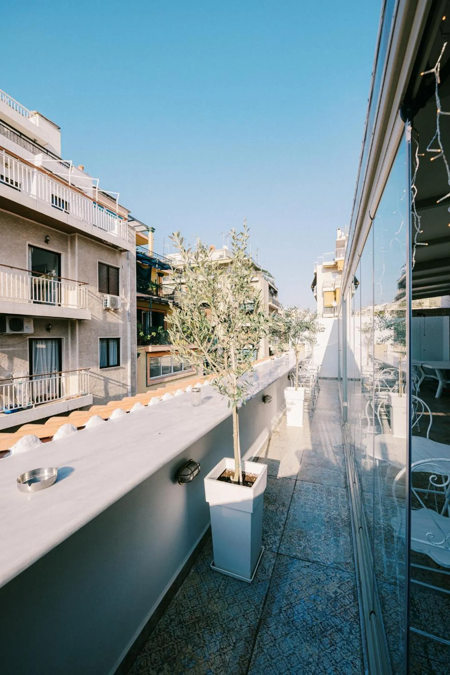 Patio in Neapolis 1897 Boutique Luxury Rooms