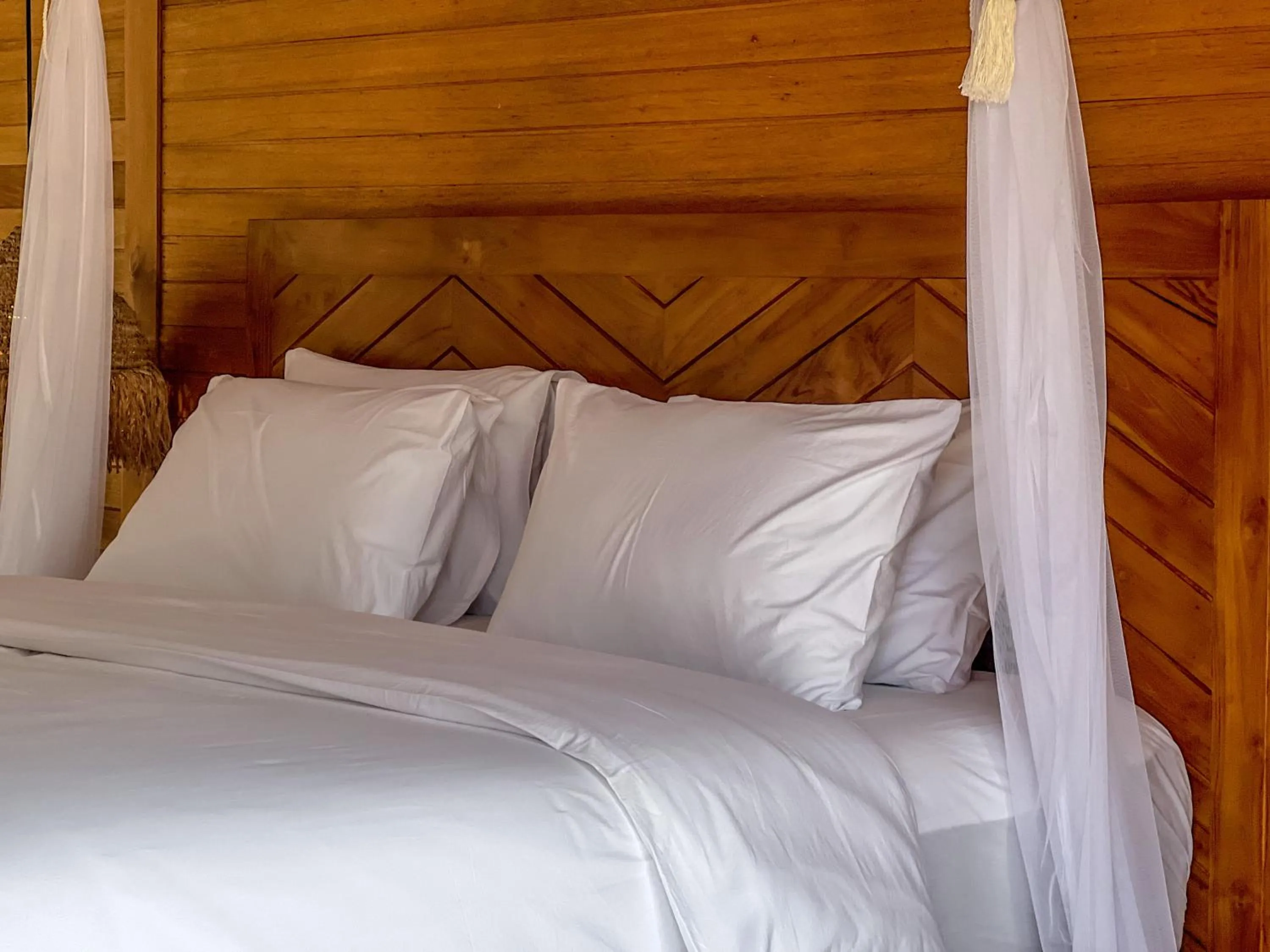 Bed in Diamond Beach Villas