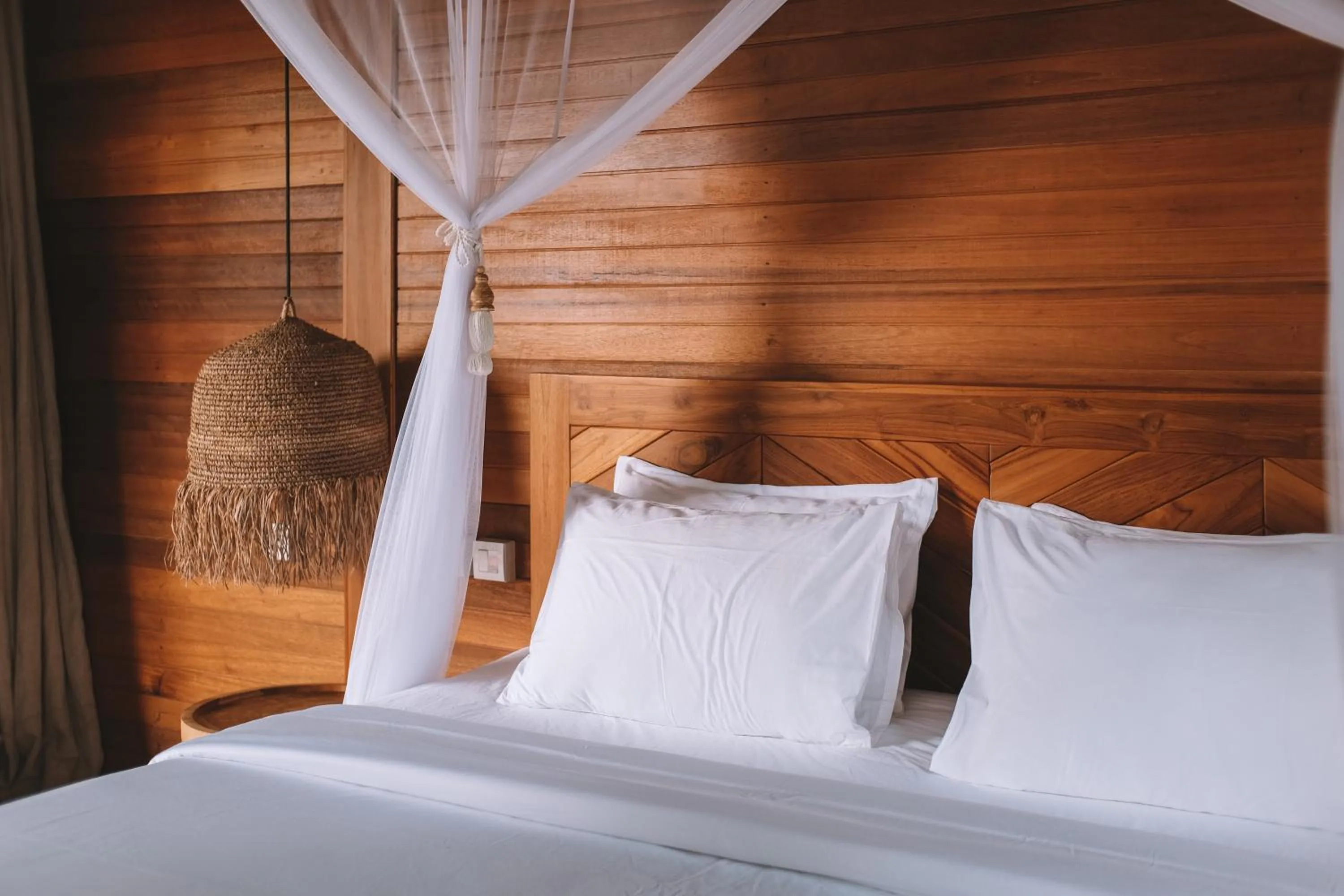 Bed in Diamond Beach Villas