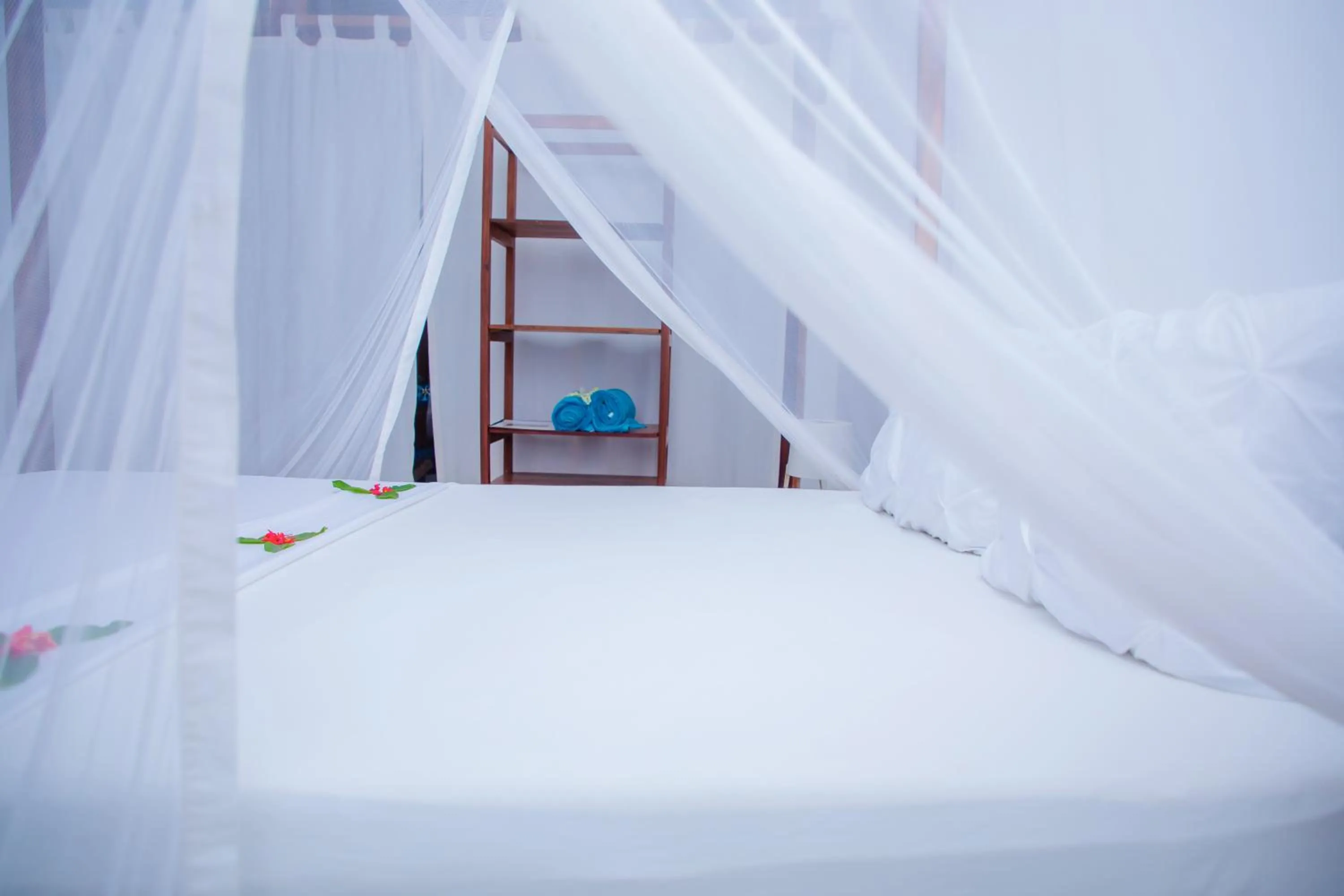 Bed in Art Hotel Zanzibar