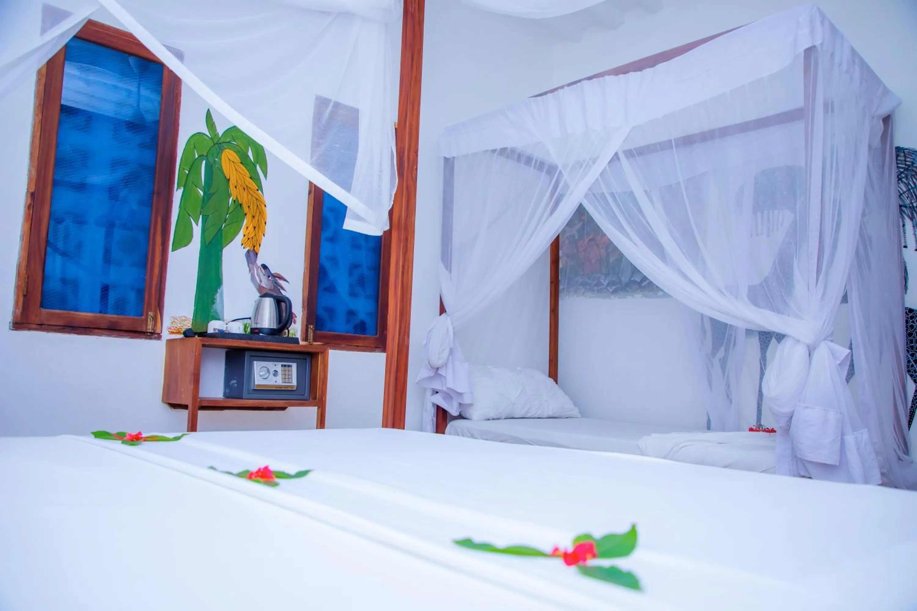 Bed in Art Hotel Zanzibar