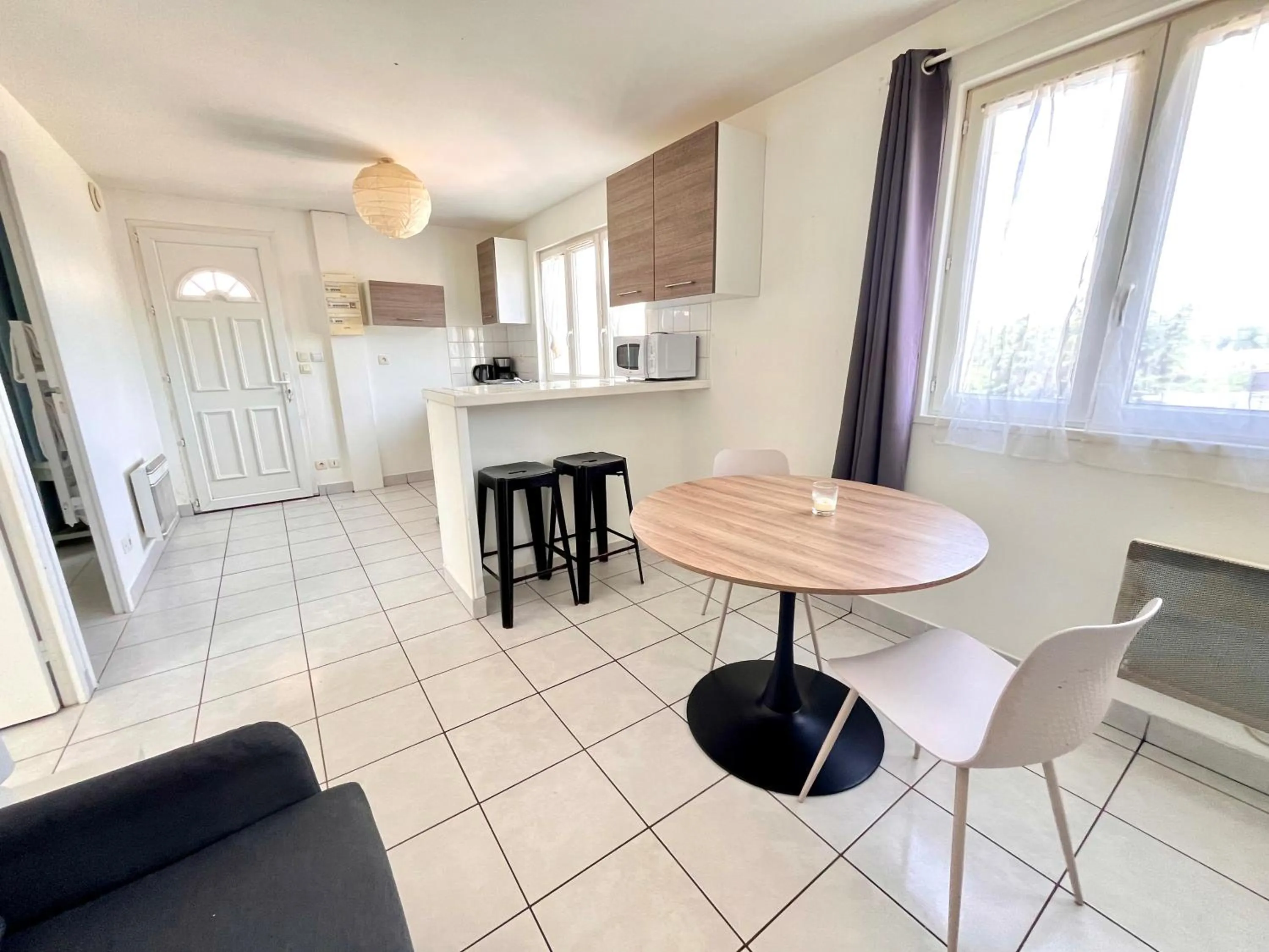 Living room in Bienvenue chez vous, Déplacement Pro