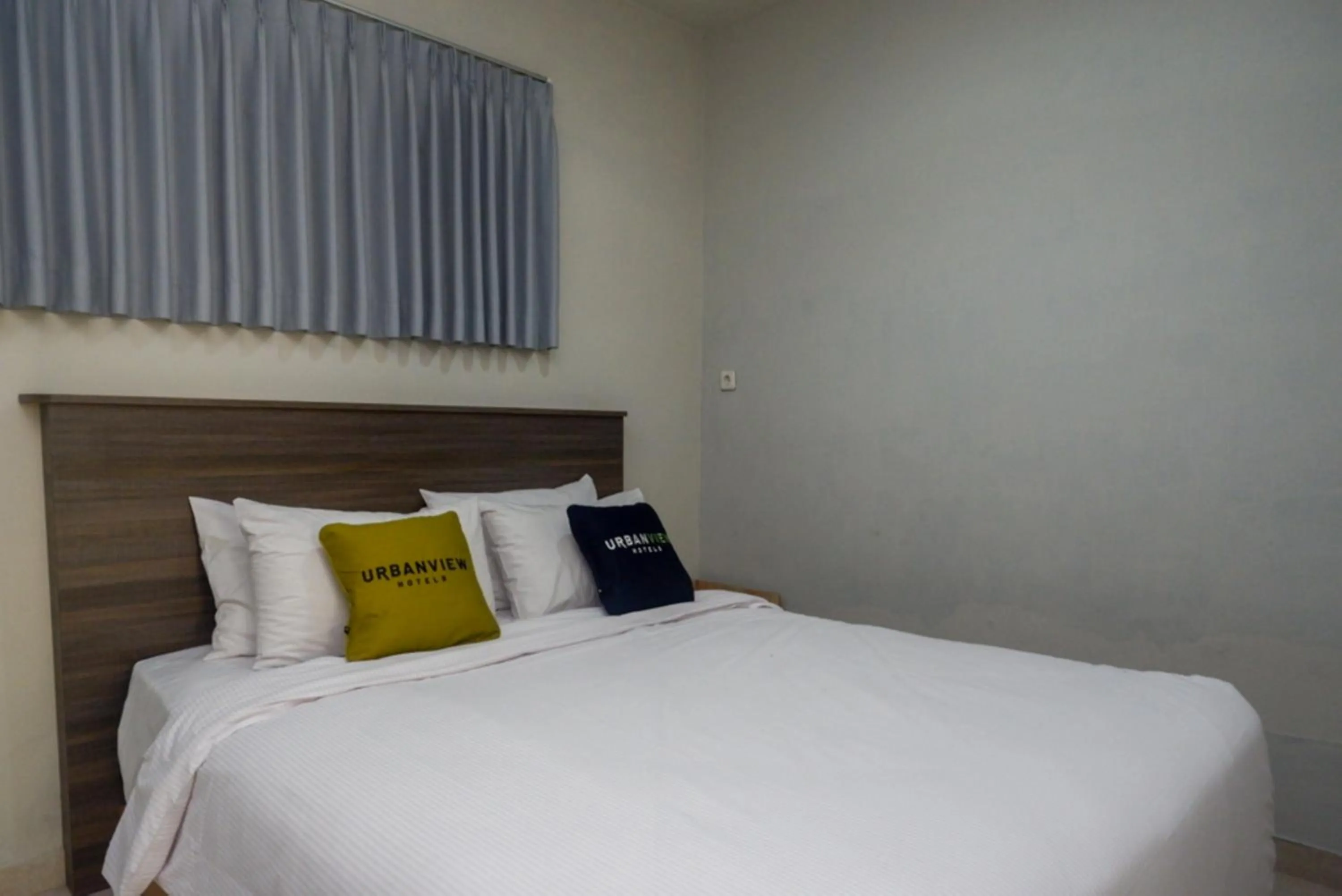 Bed in Urbanview Resort Kampoeng Media Yogyakarta by RedDoorz