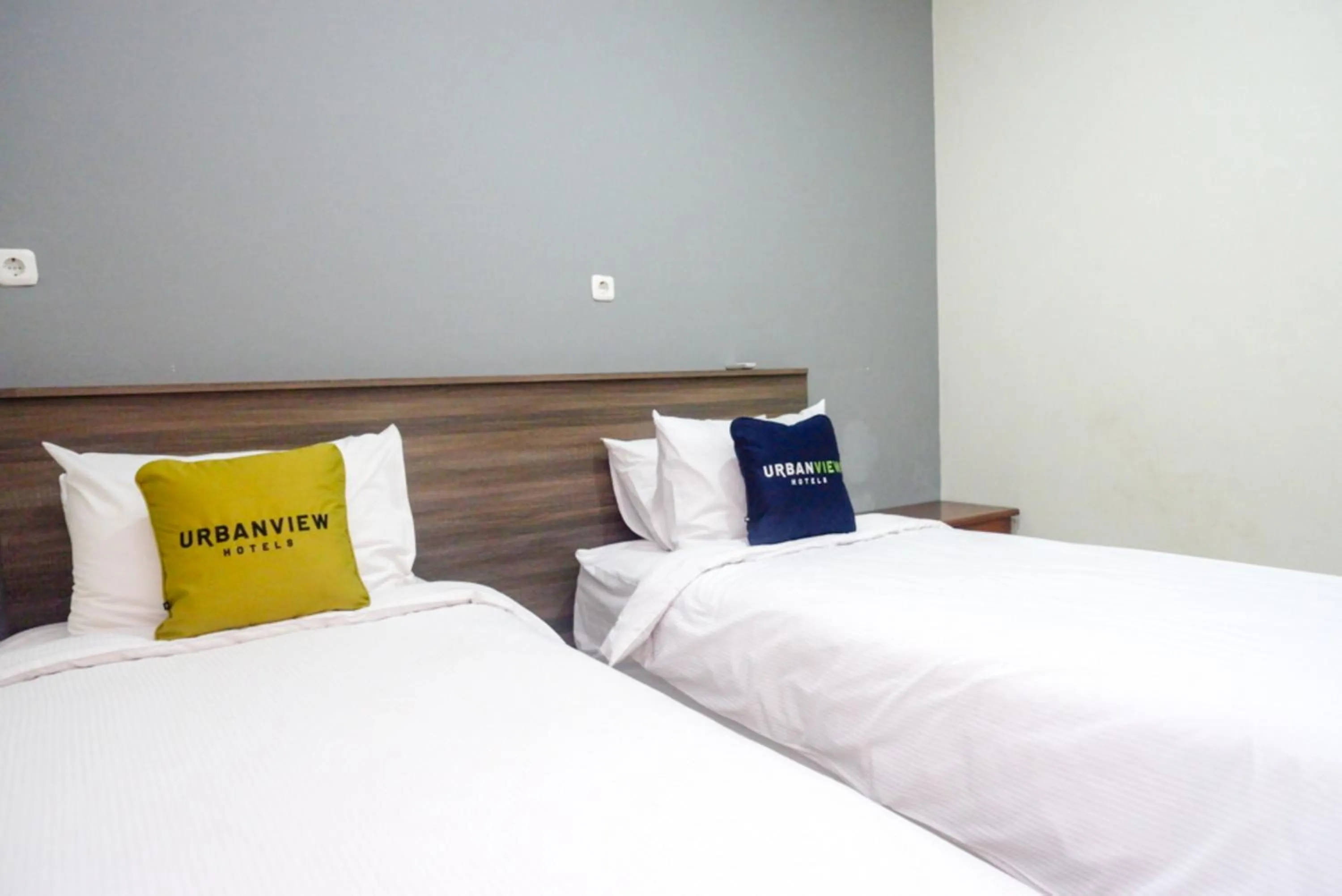 Bed in Urbanview Resort Kampoeng Media Yogyakarta by RedDoorz