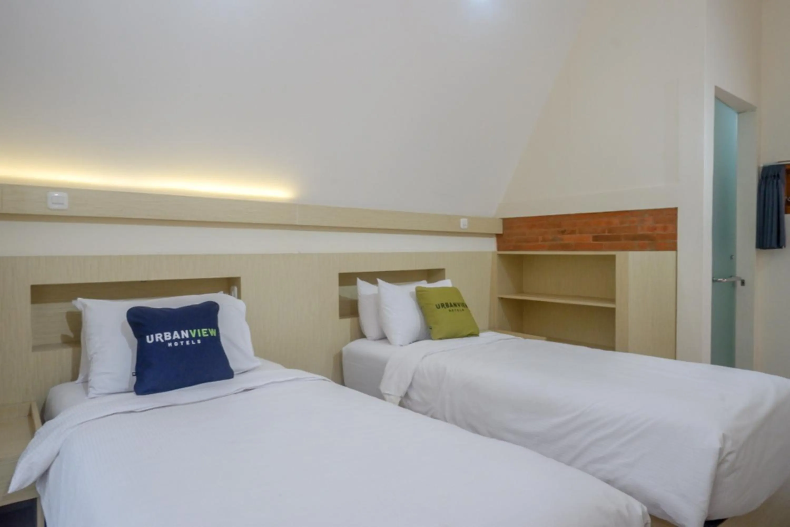 Bed in Urbanview Resort Kampoeng Media Yogyakarta by RedDoorz