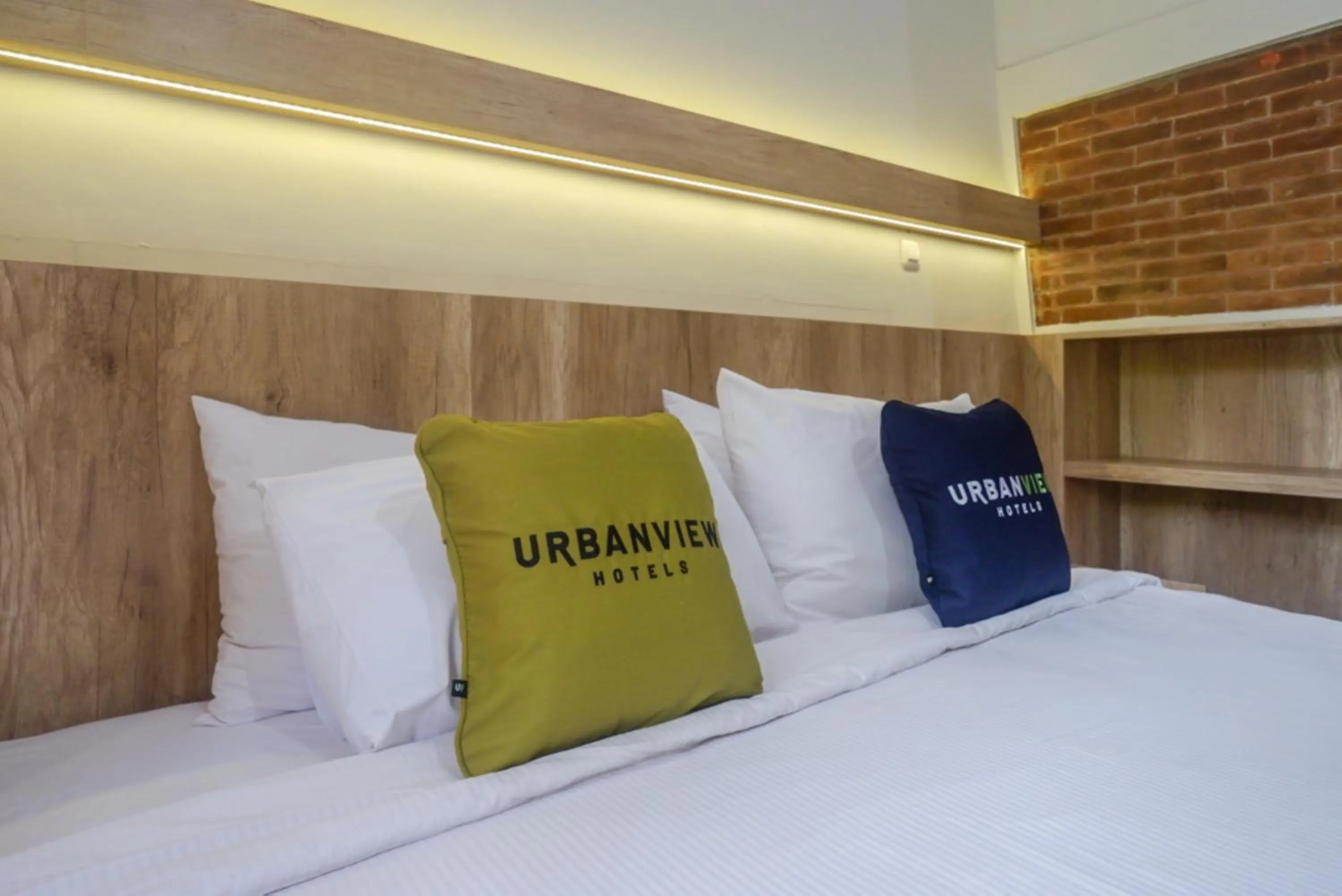 Bed in Urbanview Resort Kampoeng Media Yogyakarta by RedDoorz