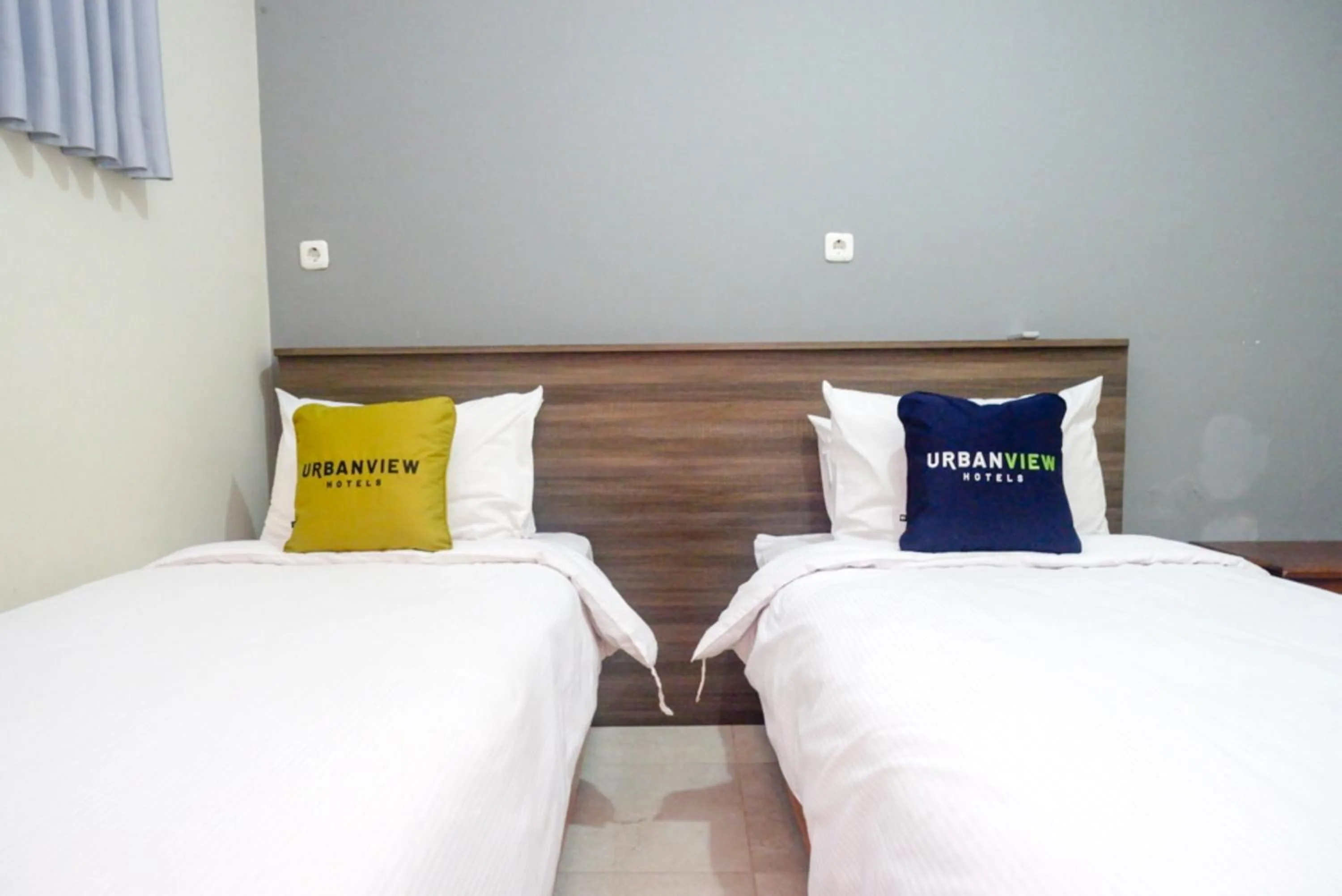Bed in Urbanview Resort Kampoeng Media Yogyakarta by RedDoorz