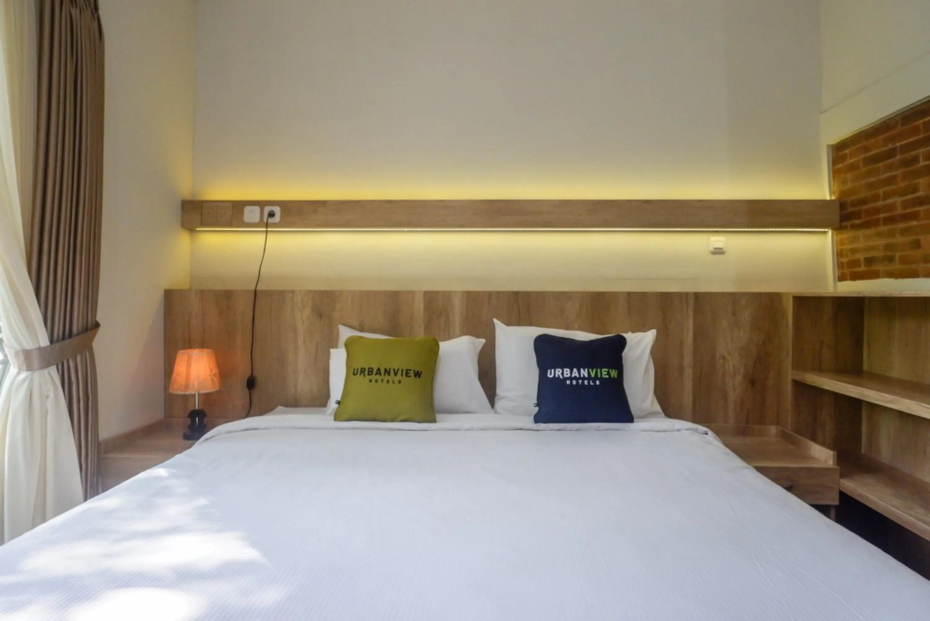 Bed in Urbanview Resort Kampoeng Media Yogyakarta by RedDoorz
