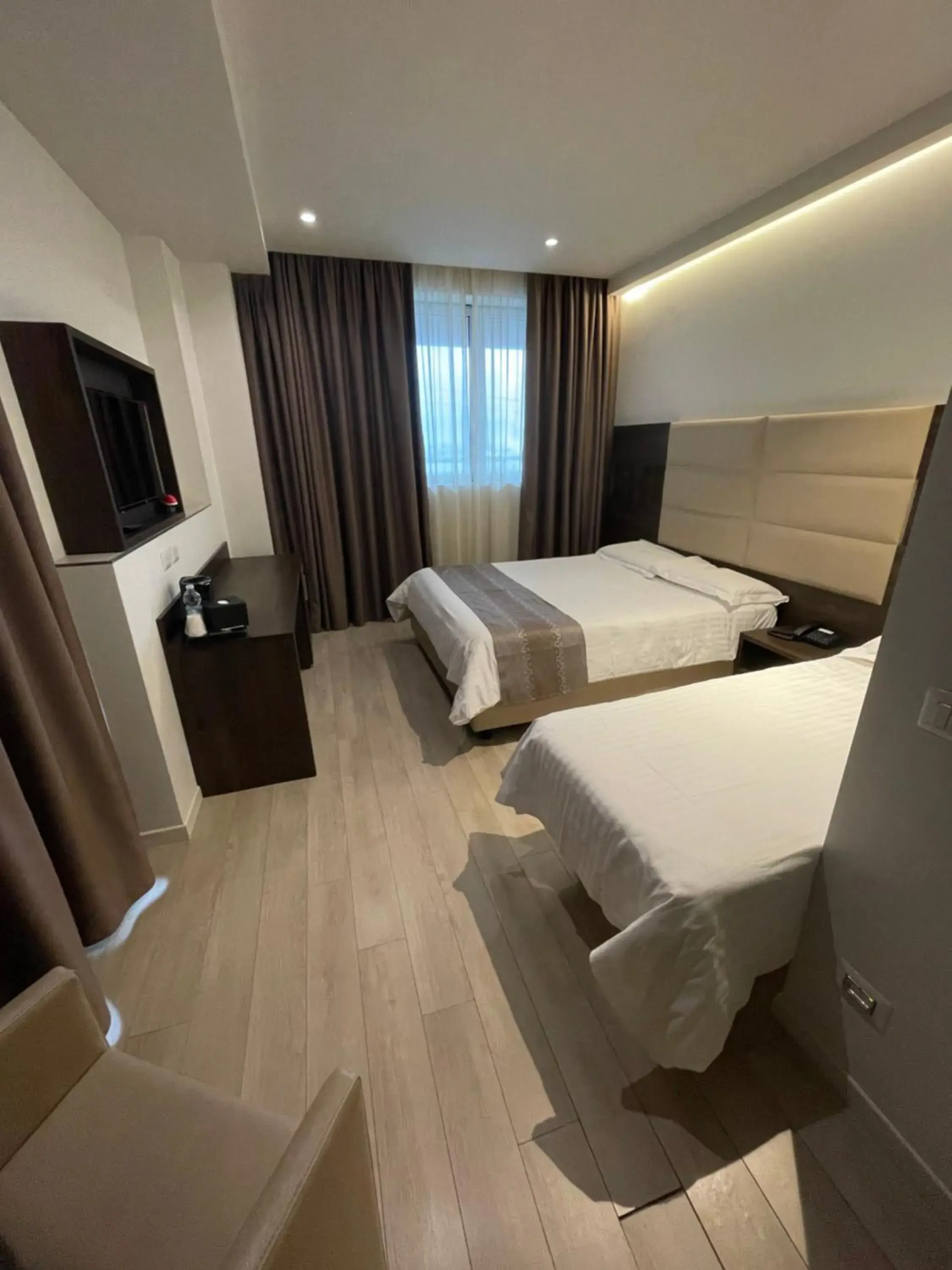 Deluxe Triple Room in HotelLuxuryPrato Deluxe Triple Room in HotelLuxuryPrato