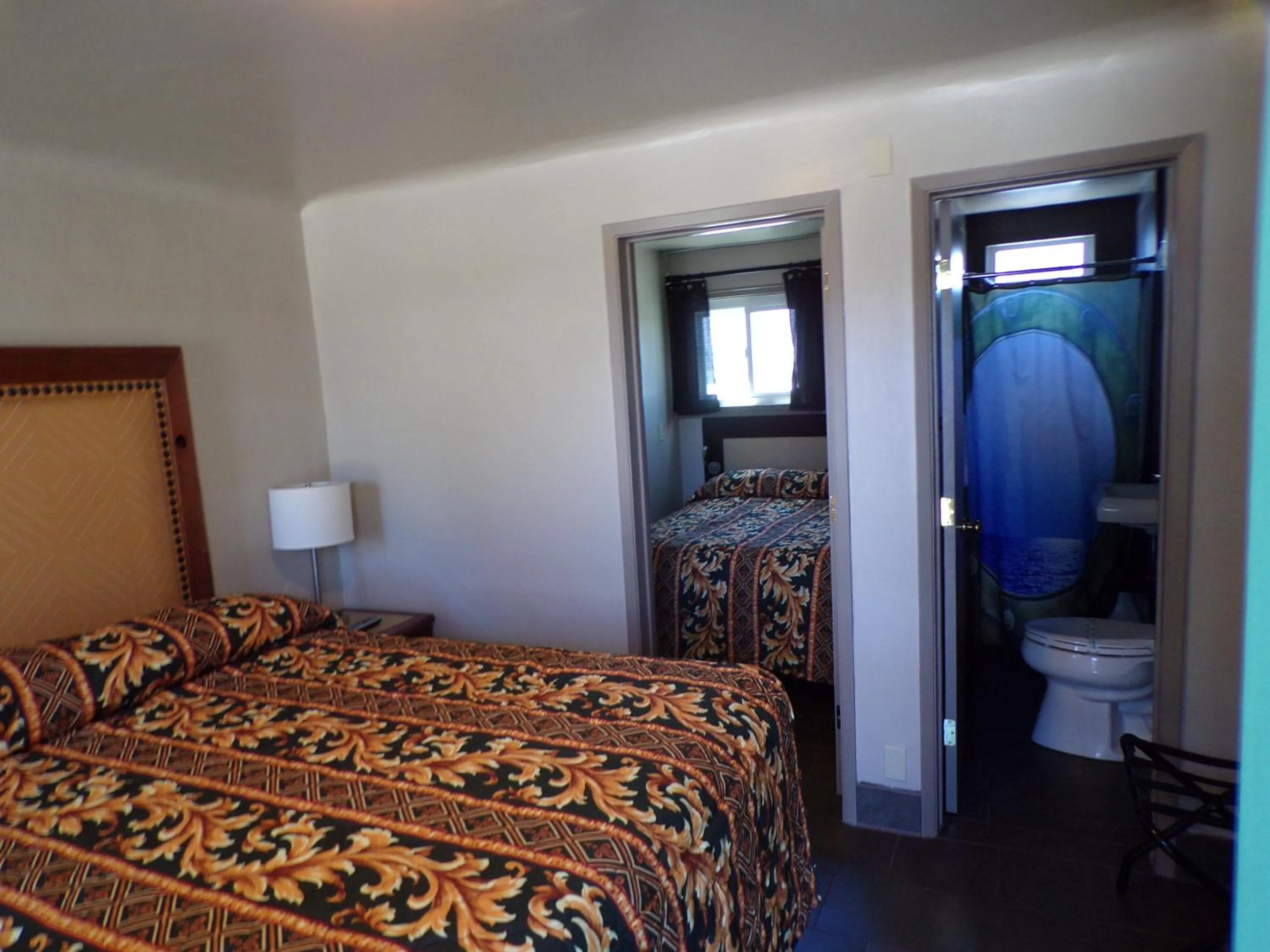 Bedroom, Bed in Cypress Tree Motel