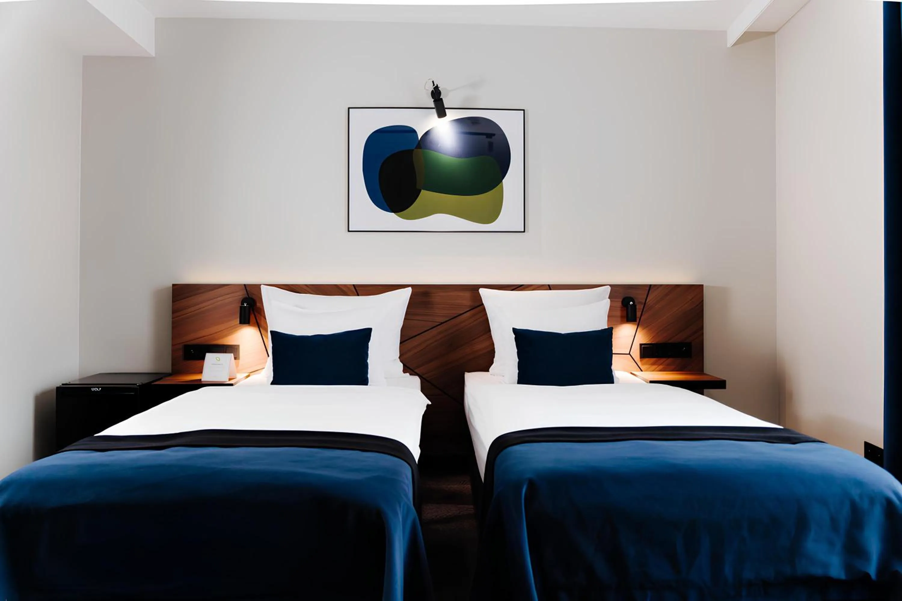 Bed in Ascot Premium Hotel