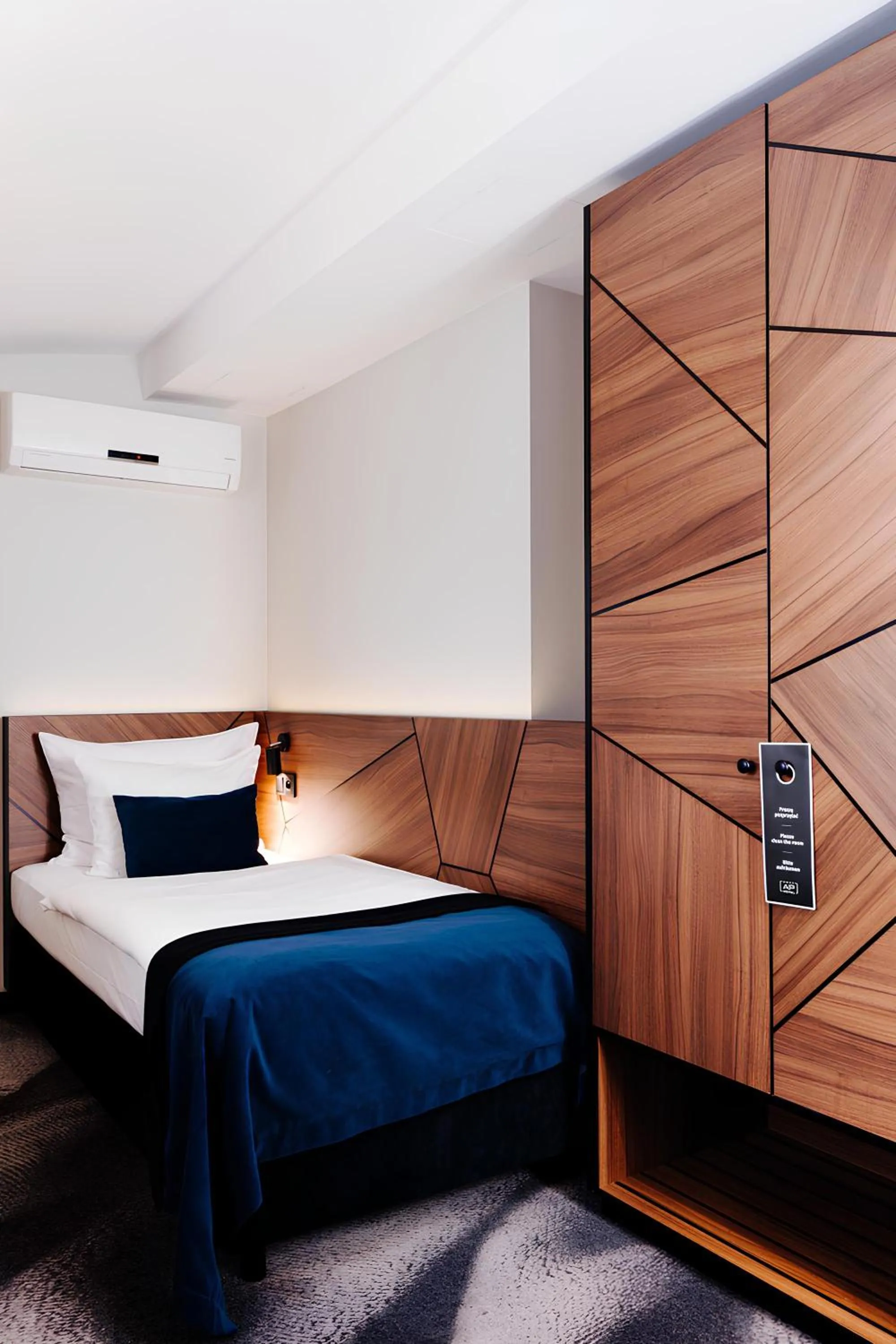 Bed in Ascot Premium Hotel