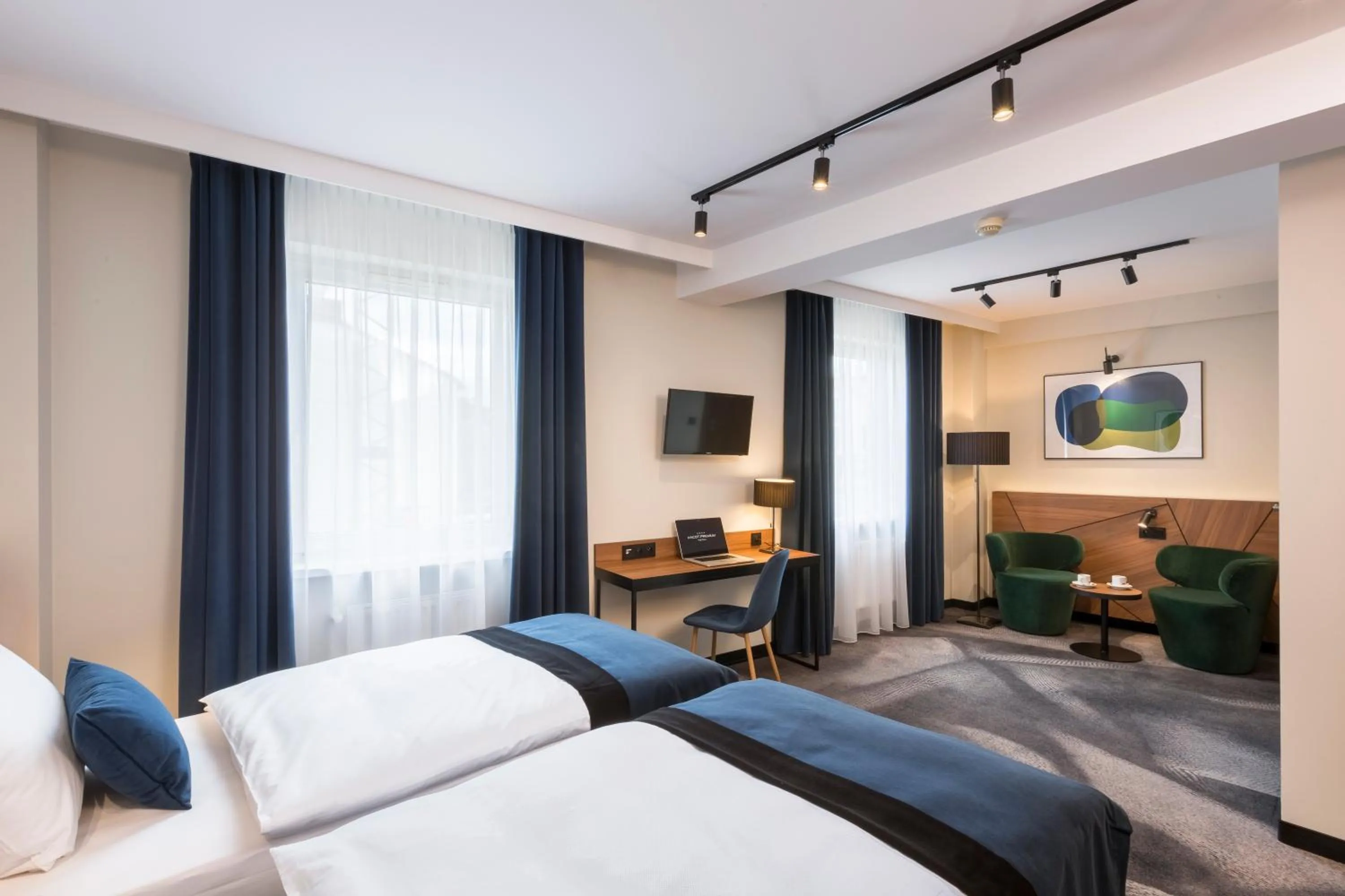 Communal lounge/ TV room, Bed in Ascot Premium Hotel