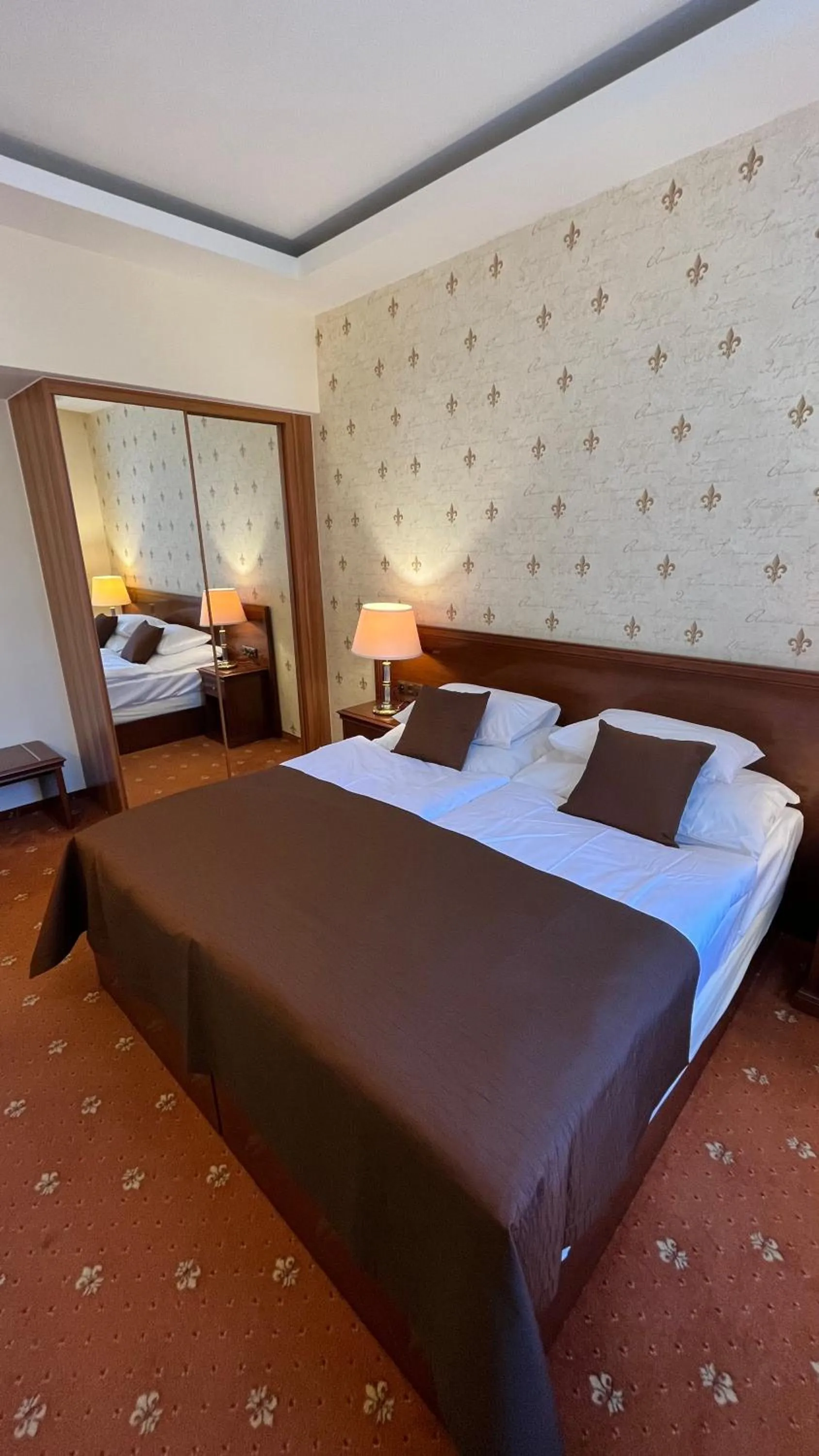 Bed in FLEUR DE LIS HOTEL