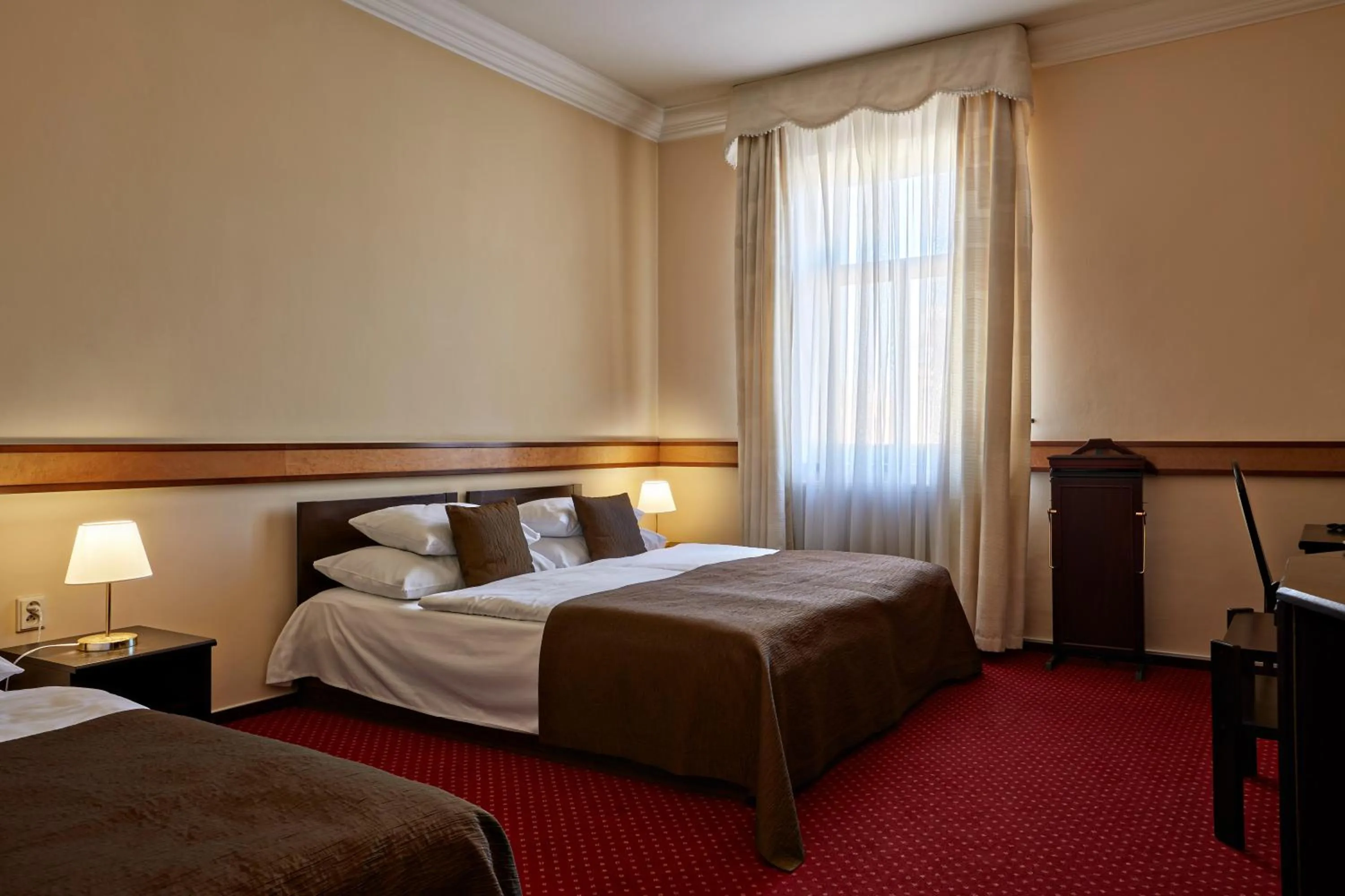 Bed in FLEUR DE LIS HOTEL