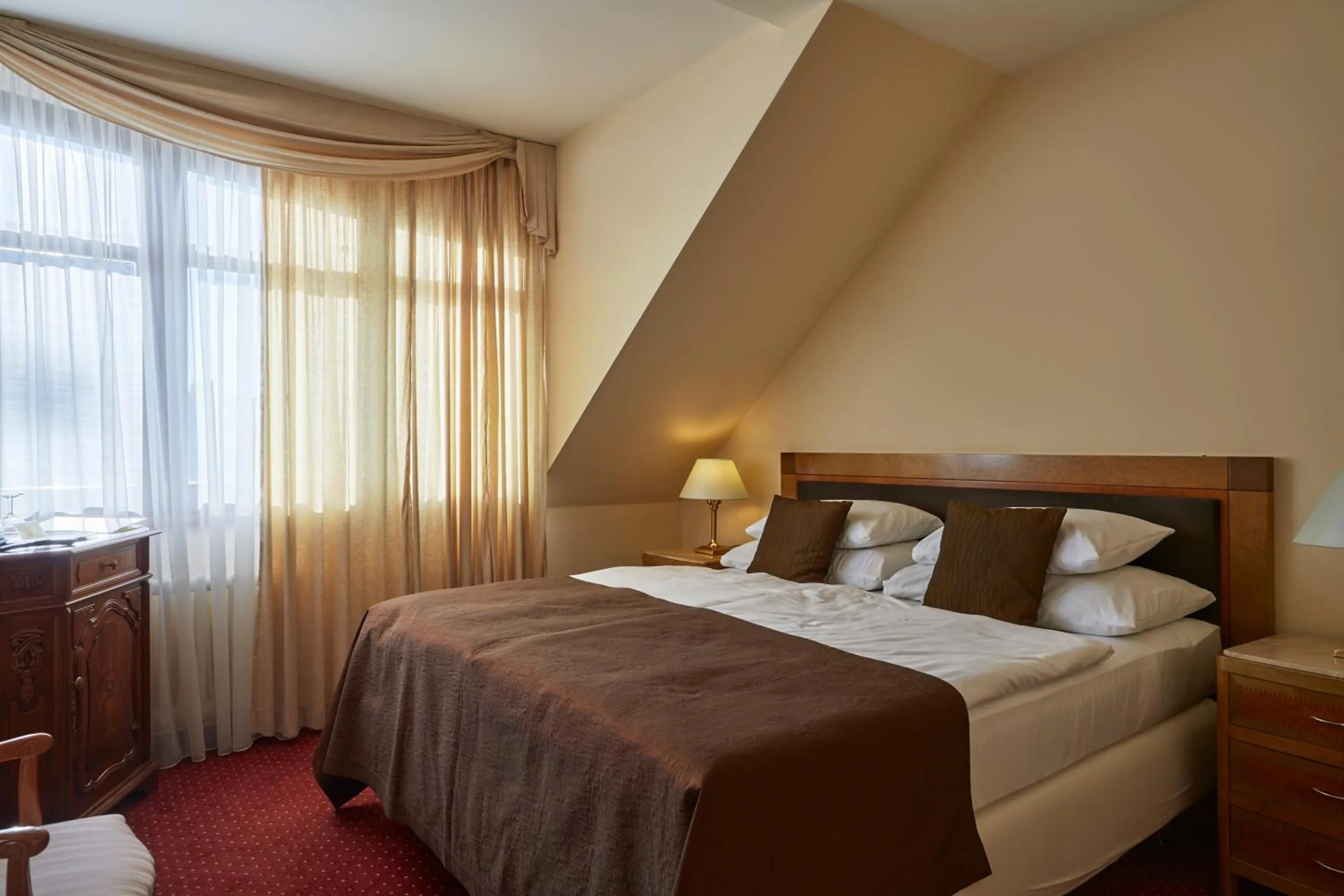 Bed in FLEUR DE LIS HOTEL