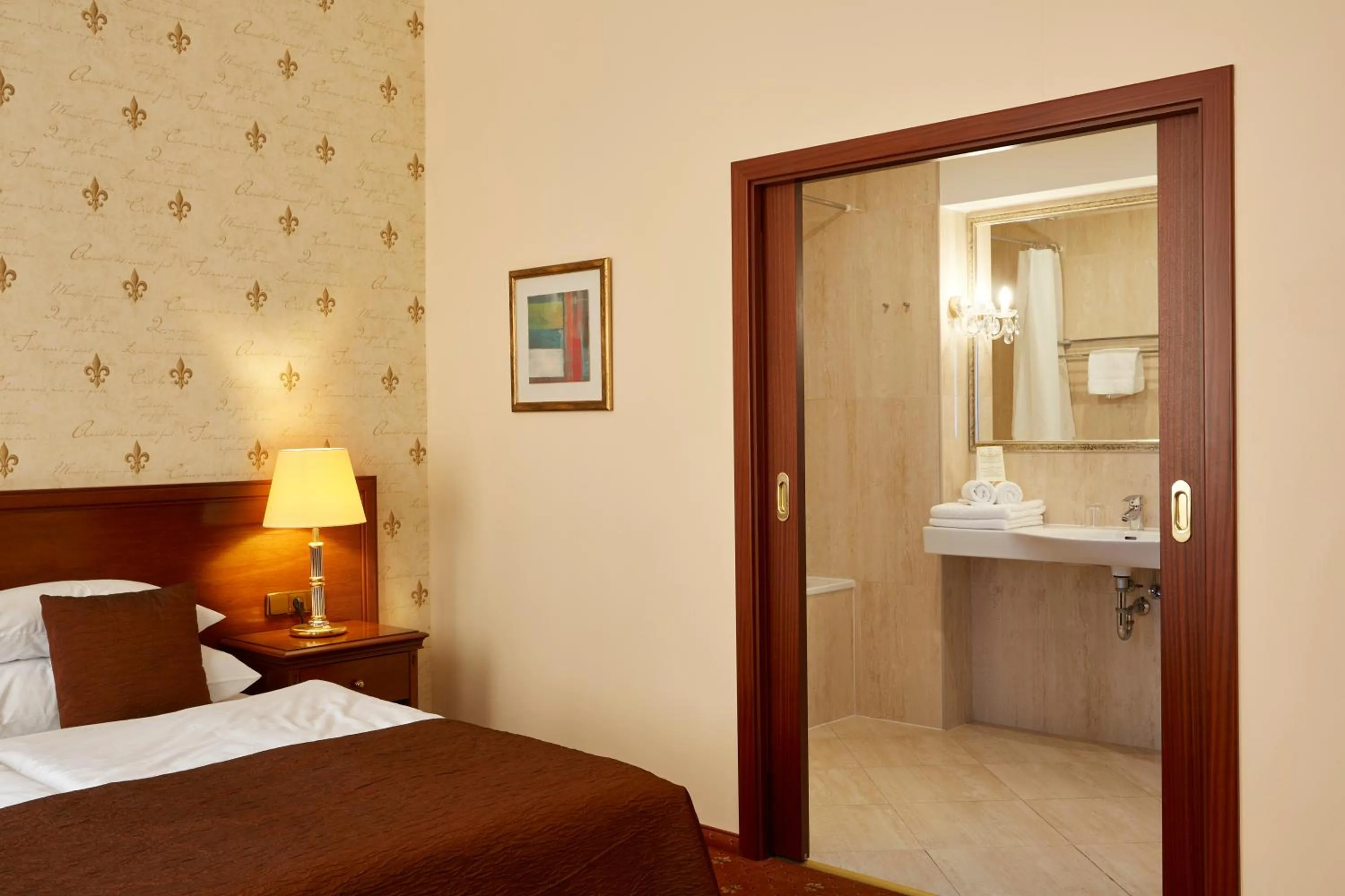 Bed in FLEUR DE LIS HOTEL