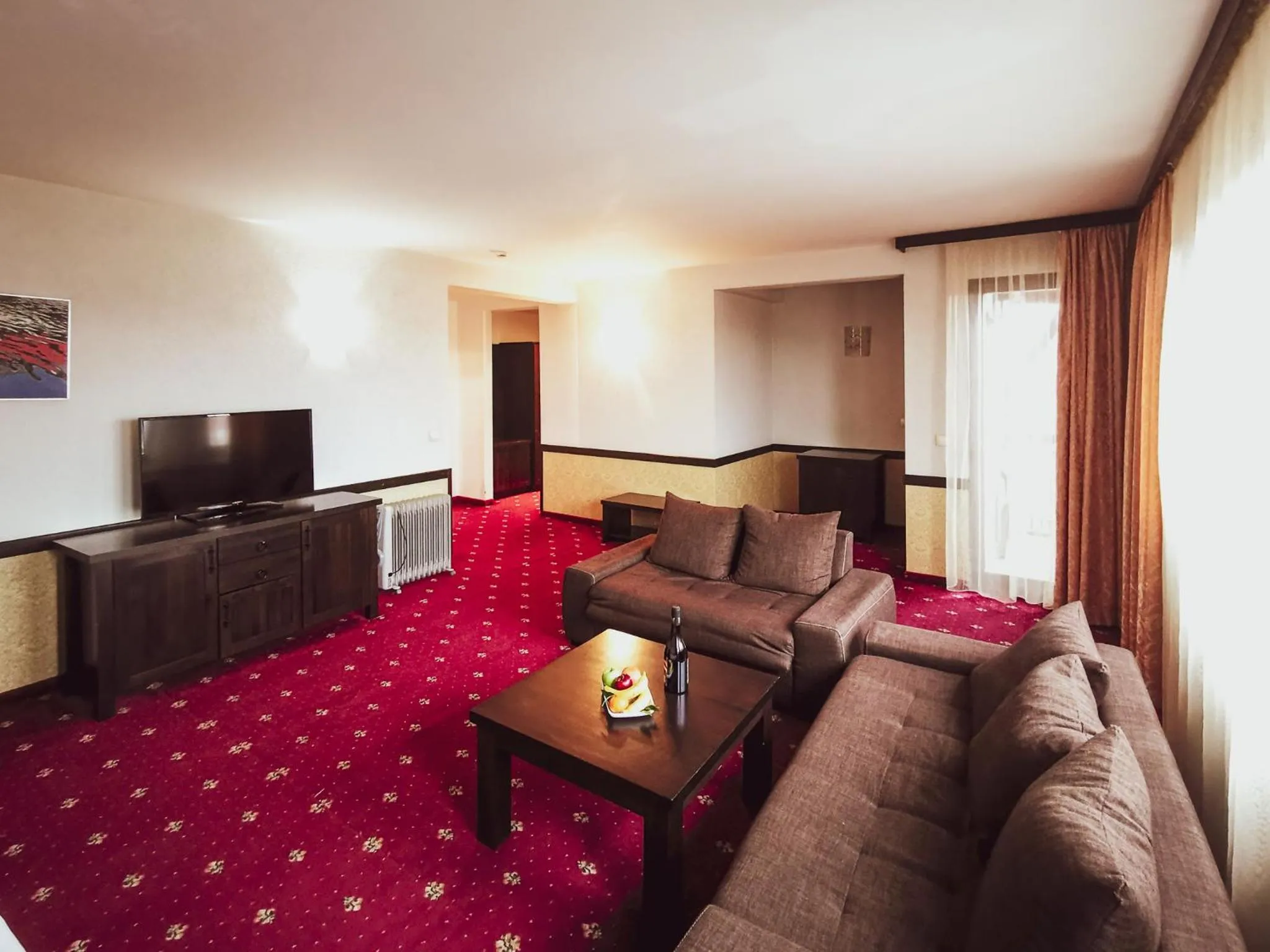 Communal lounge/ TV room in Trinity Residence Bansko with Free Shuttle to Gondola