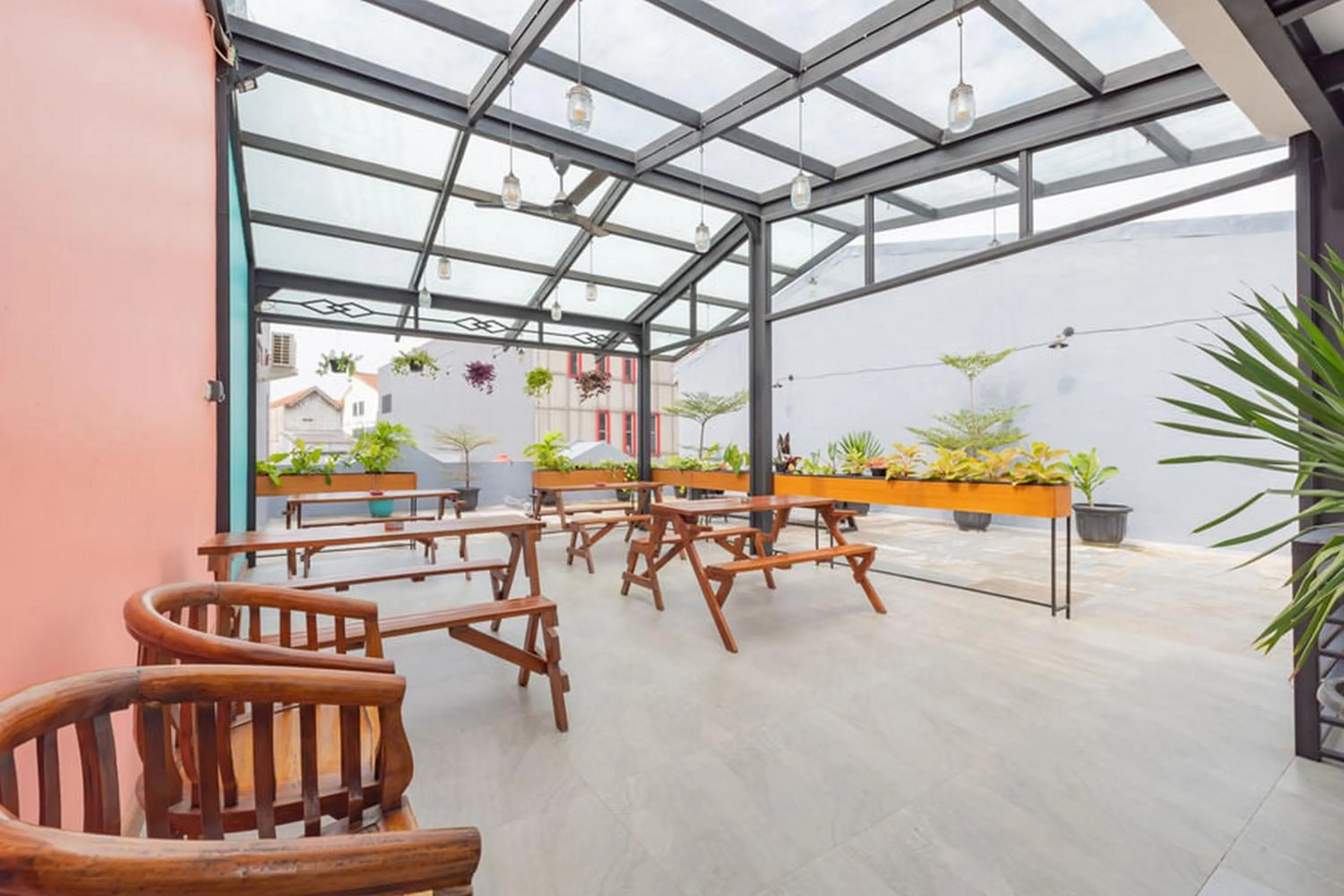 Seating area in Sans Hotel Suryakencana Bogor