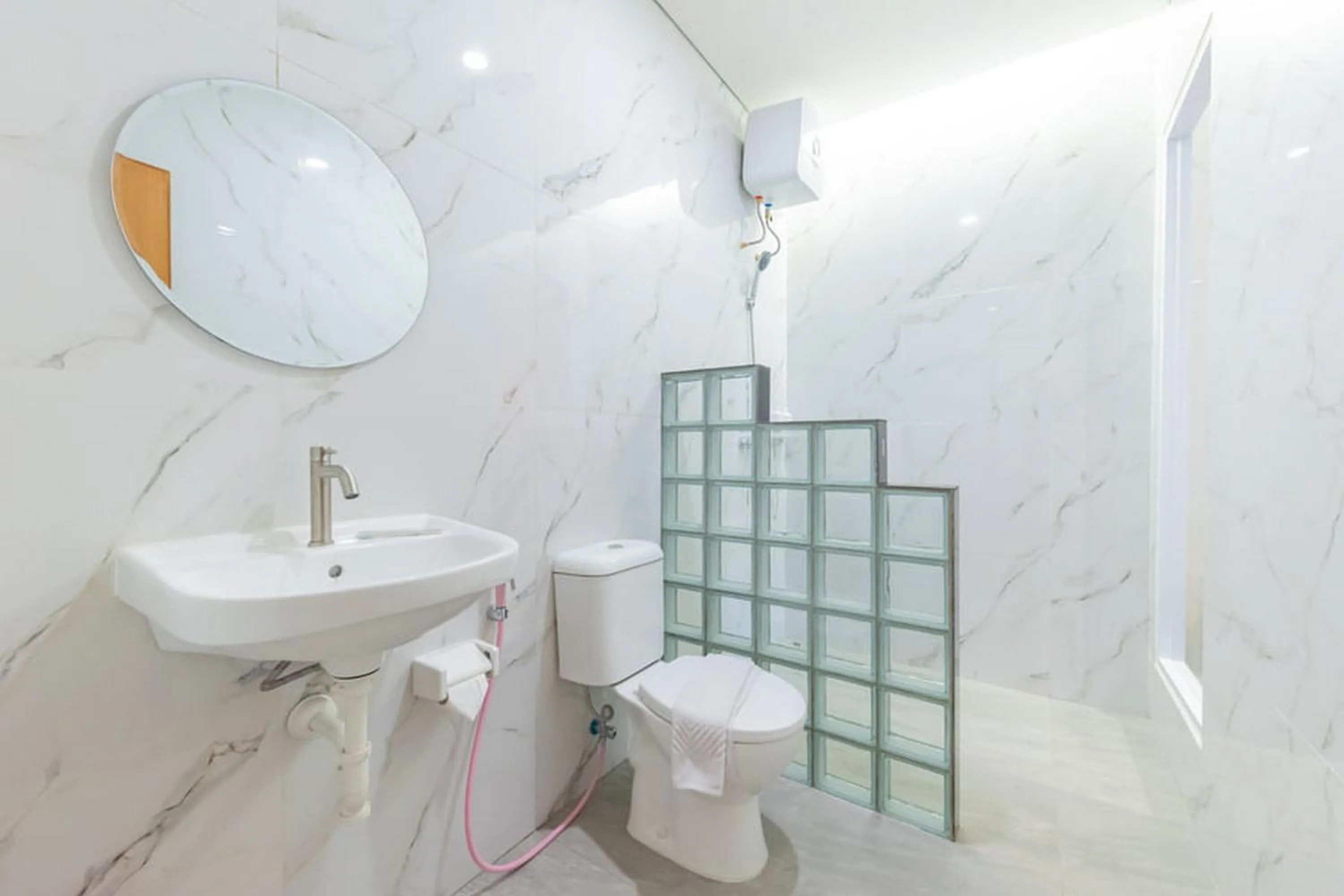 Bathroom in Sans Hotel Suryakencana Bogor