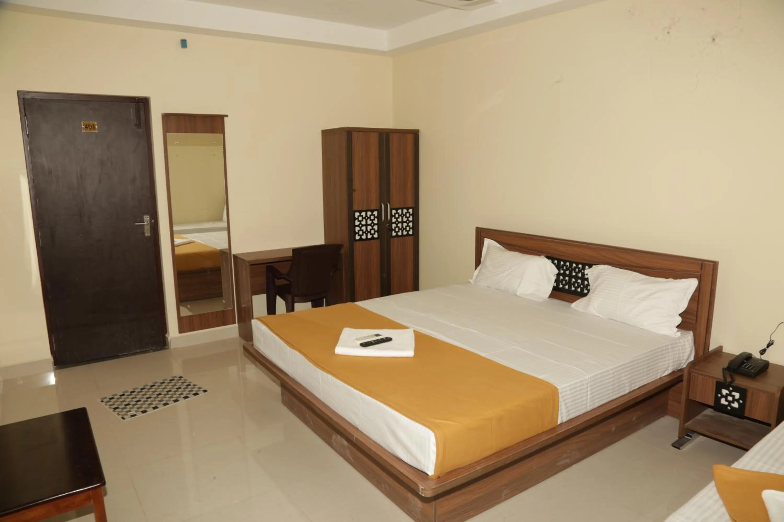 Photo of the whole room, Bed in Santhosh Inn