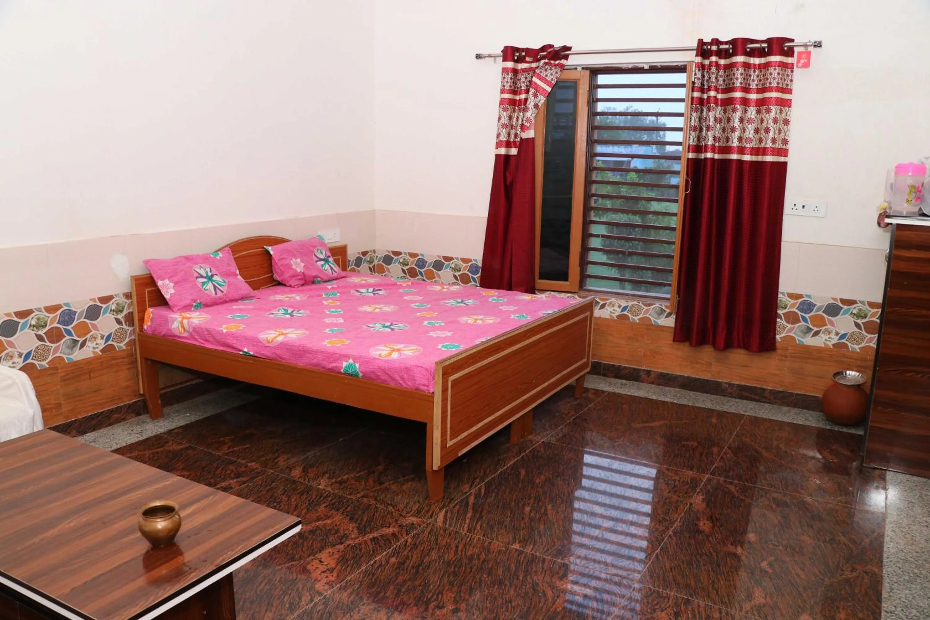 Bedroom in Hotel O POP Angoori Farm House