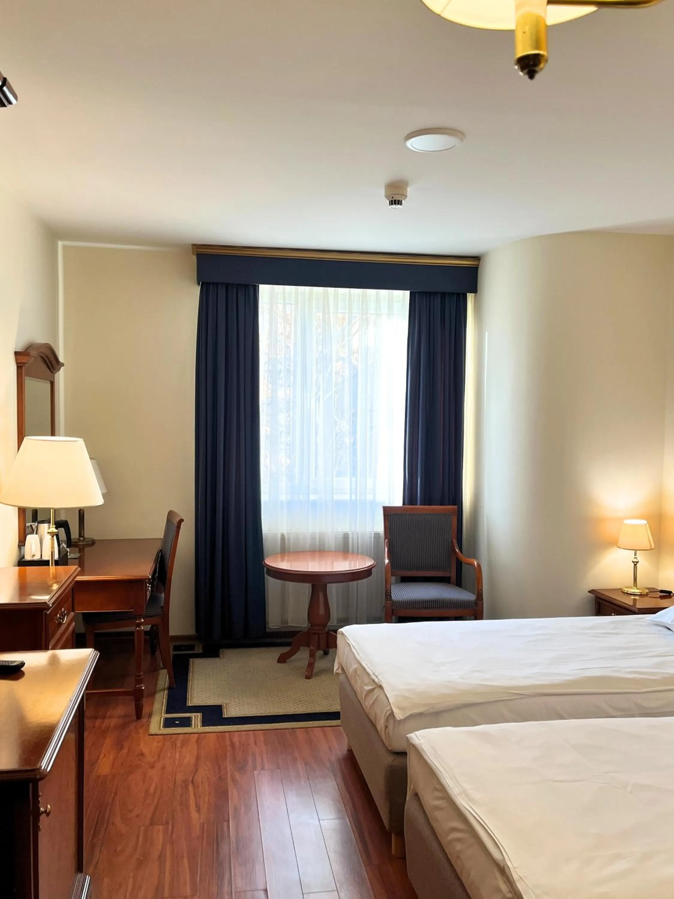 Seating area, Bed in Qubus Hotel Wrocław