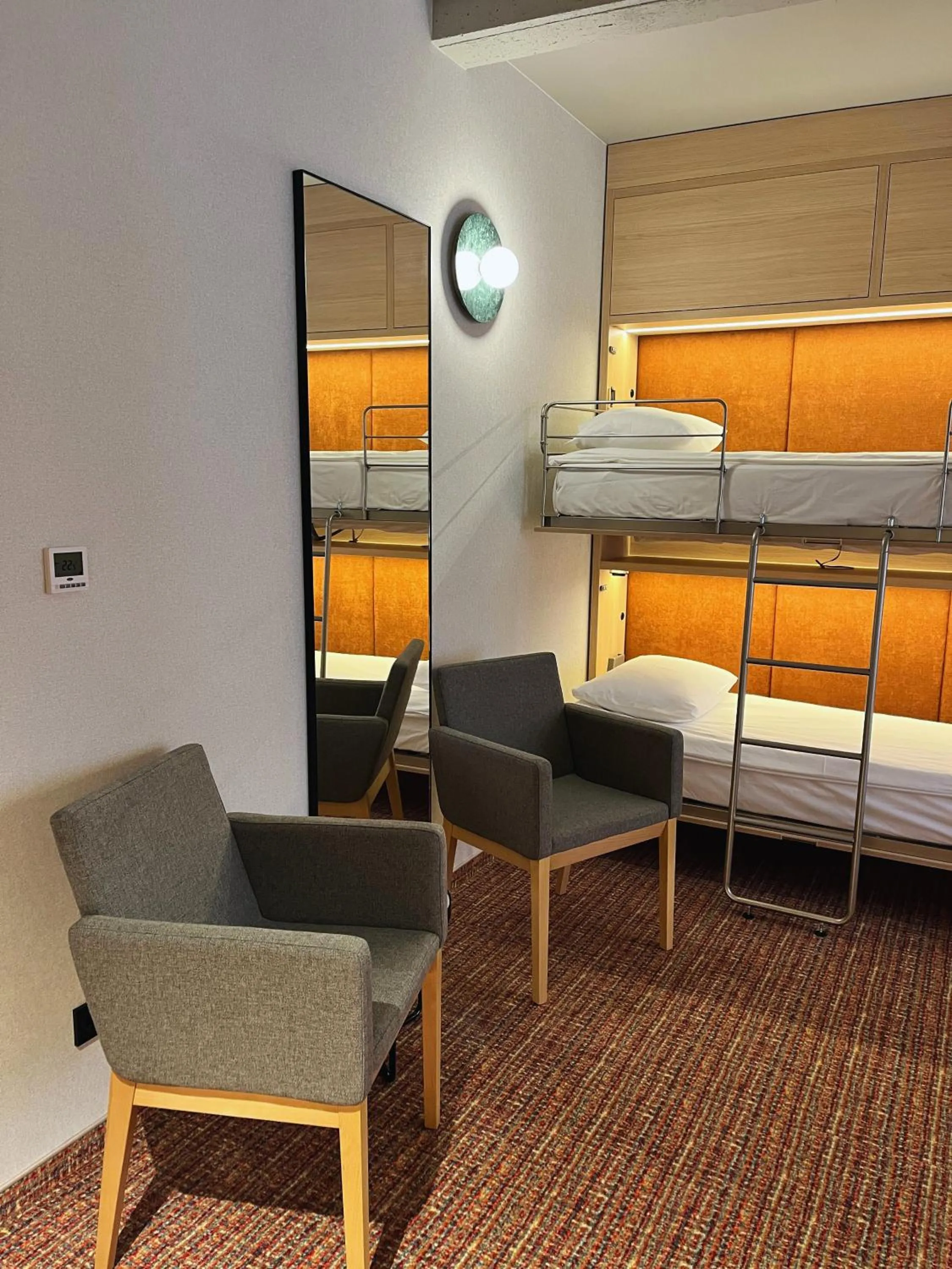 Seating area, Bed in Qubus Hotel Wrocław