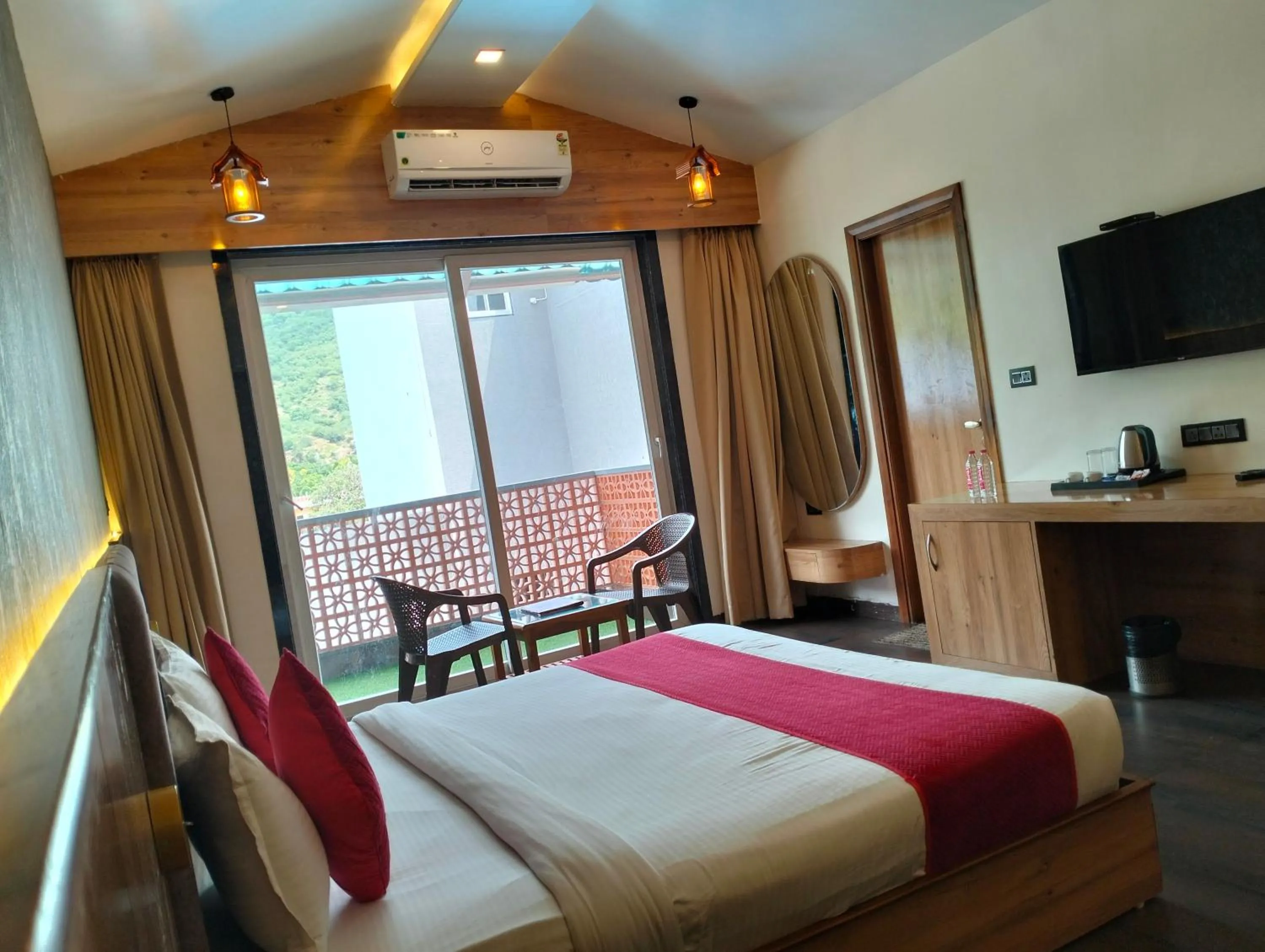 Communal lounge/ TV room, Bed in Nature Retreat Resorts- Life in Nature