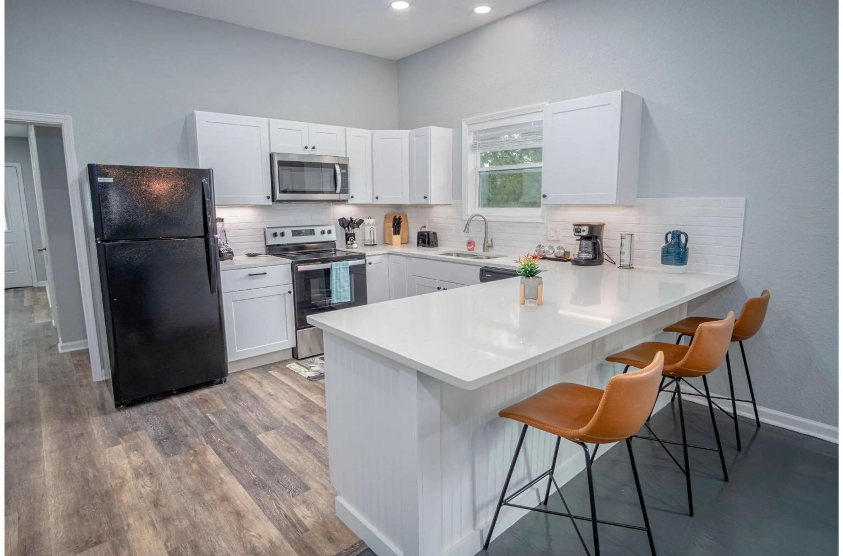 Kitchen or kitchenette in Captivating 4BR 2BA Home Near Awesome Downtown