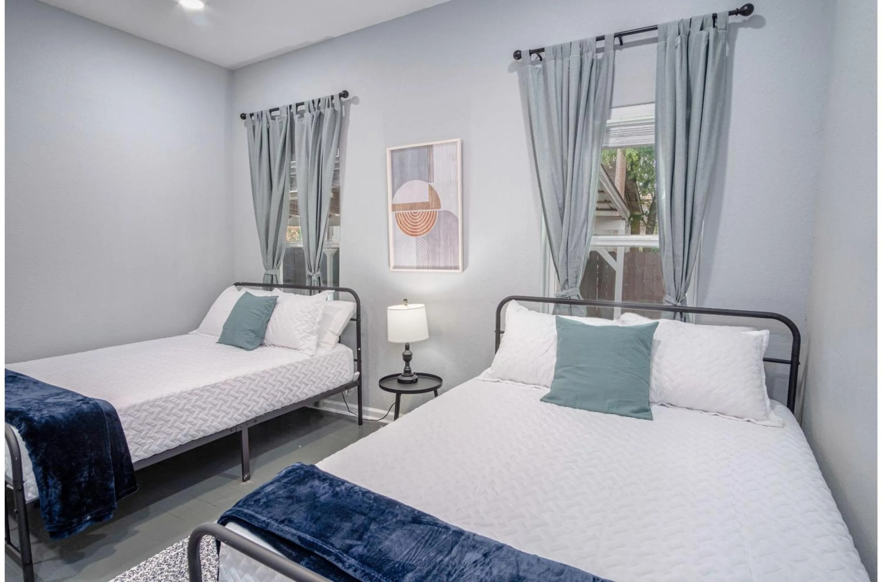 Bed in Captivating 4BR 2BA Home Near Awesome Downtown