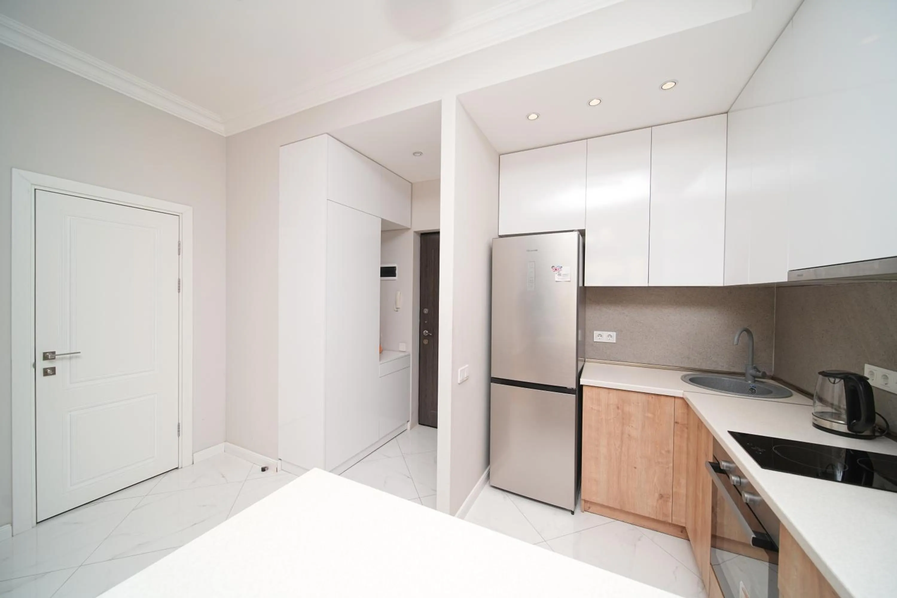 Kitchen or kitchenette in Sweet Home Apart-Hotel