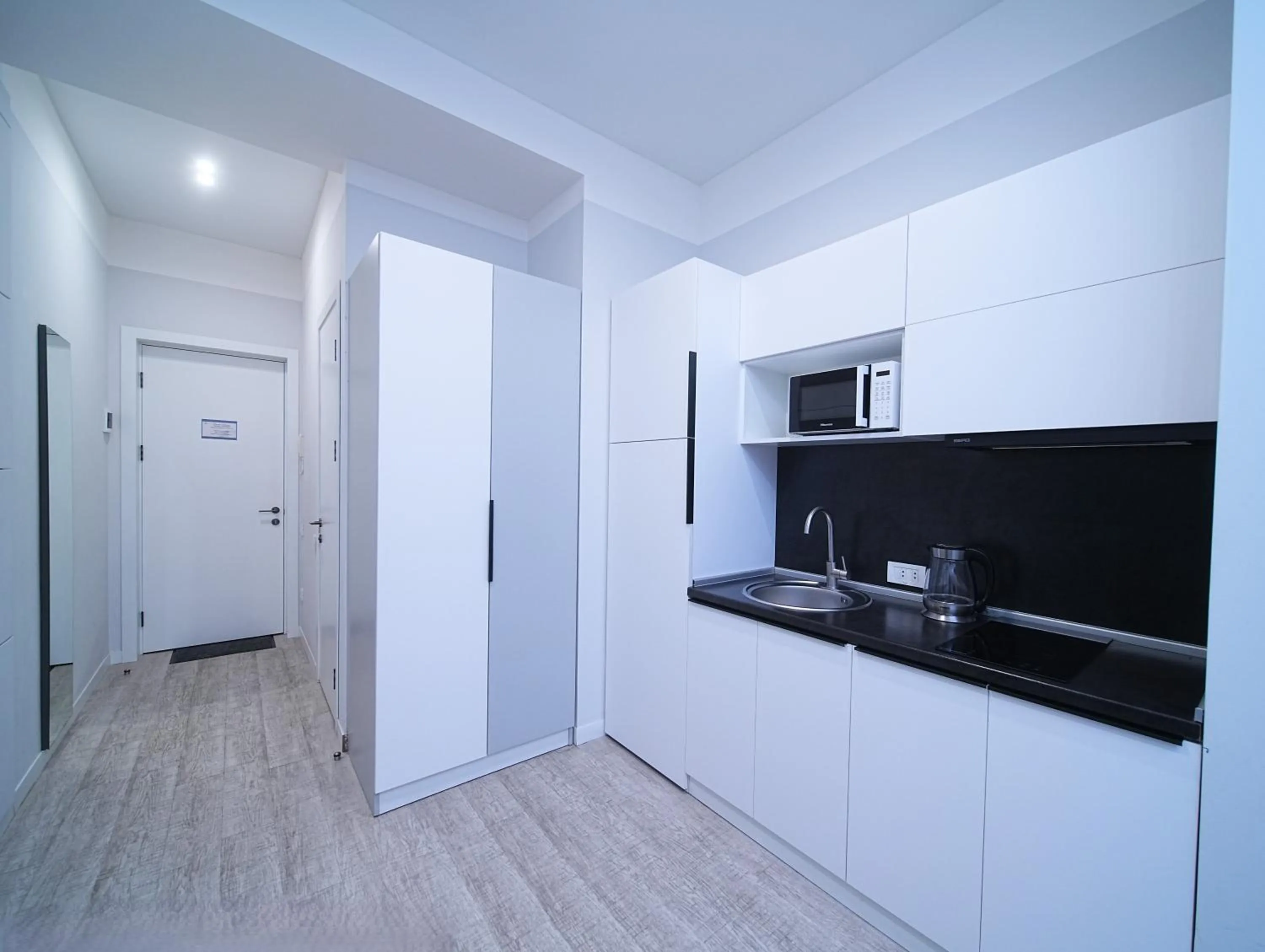 Kitchen or kitchenette in Sweet Home Apart-Hotel