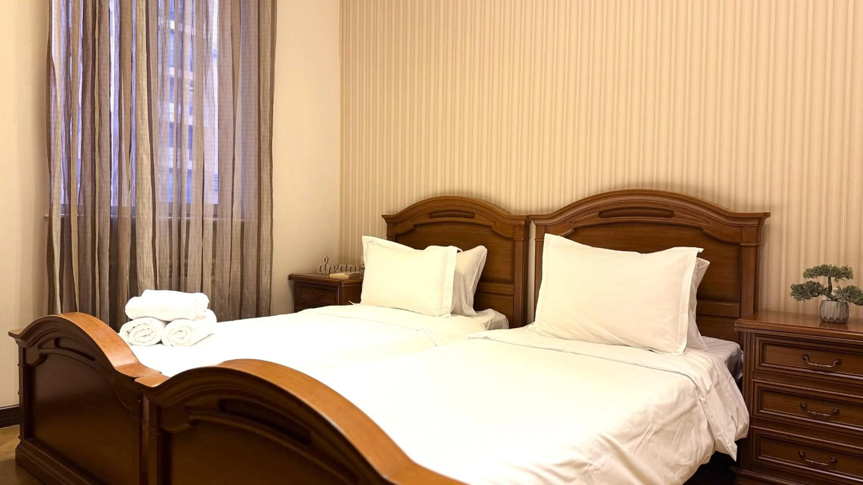 Bed in Sweet Home Apart-Hotel