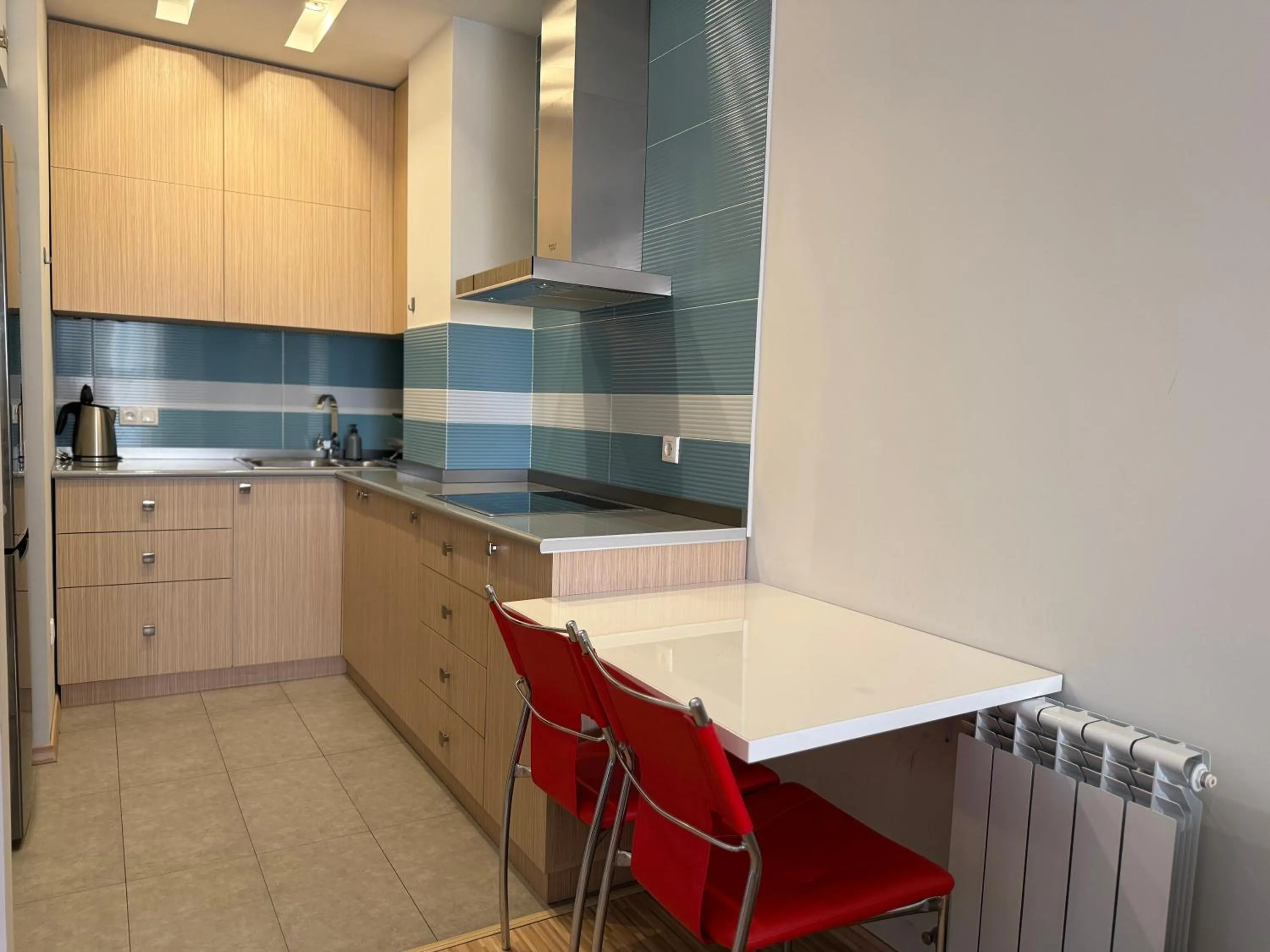 Kitchen or kitchenette in Sweet Home Apart-Hotel