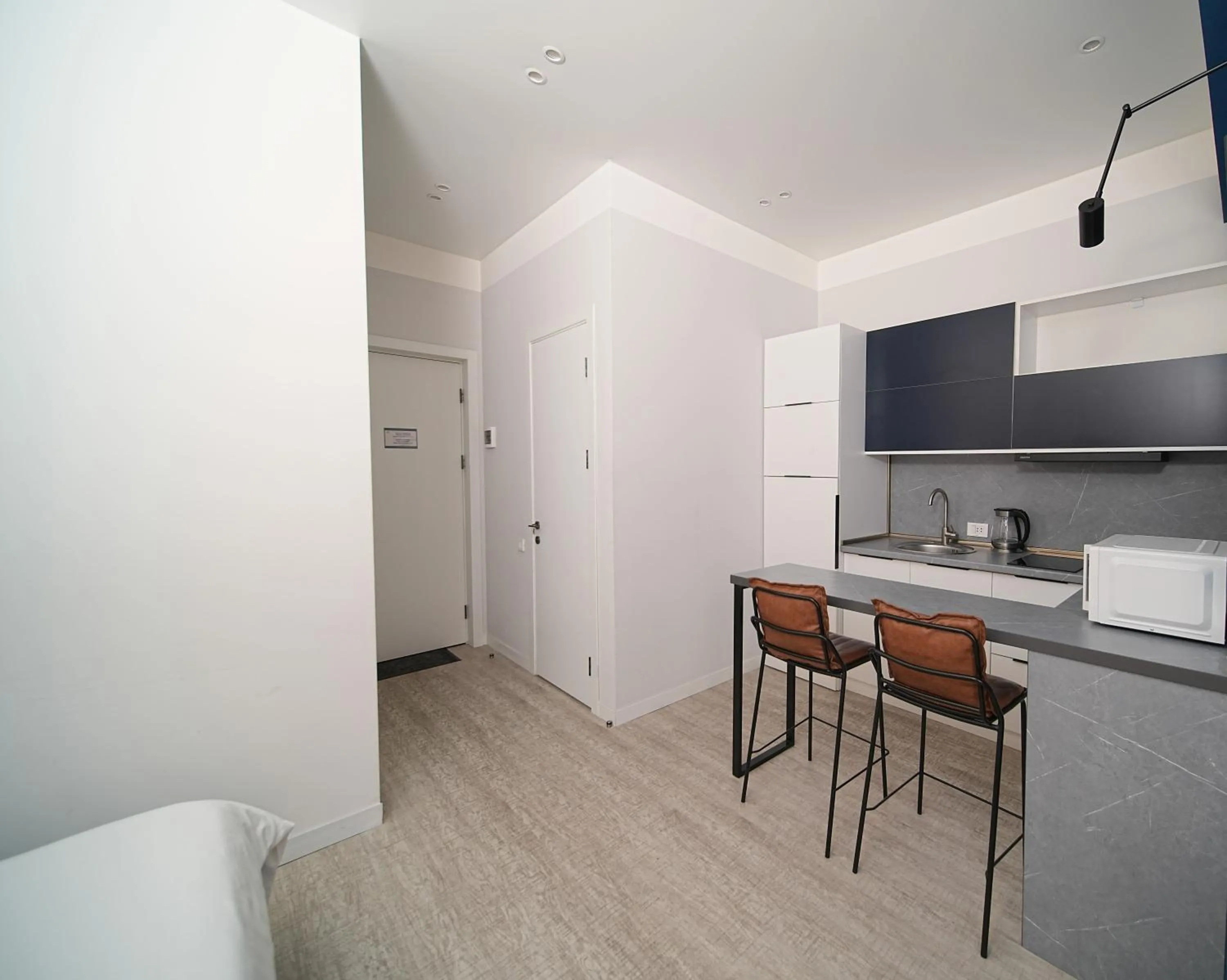 Kitchen or kitchenette in Sweet Home Apart-Hotel